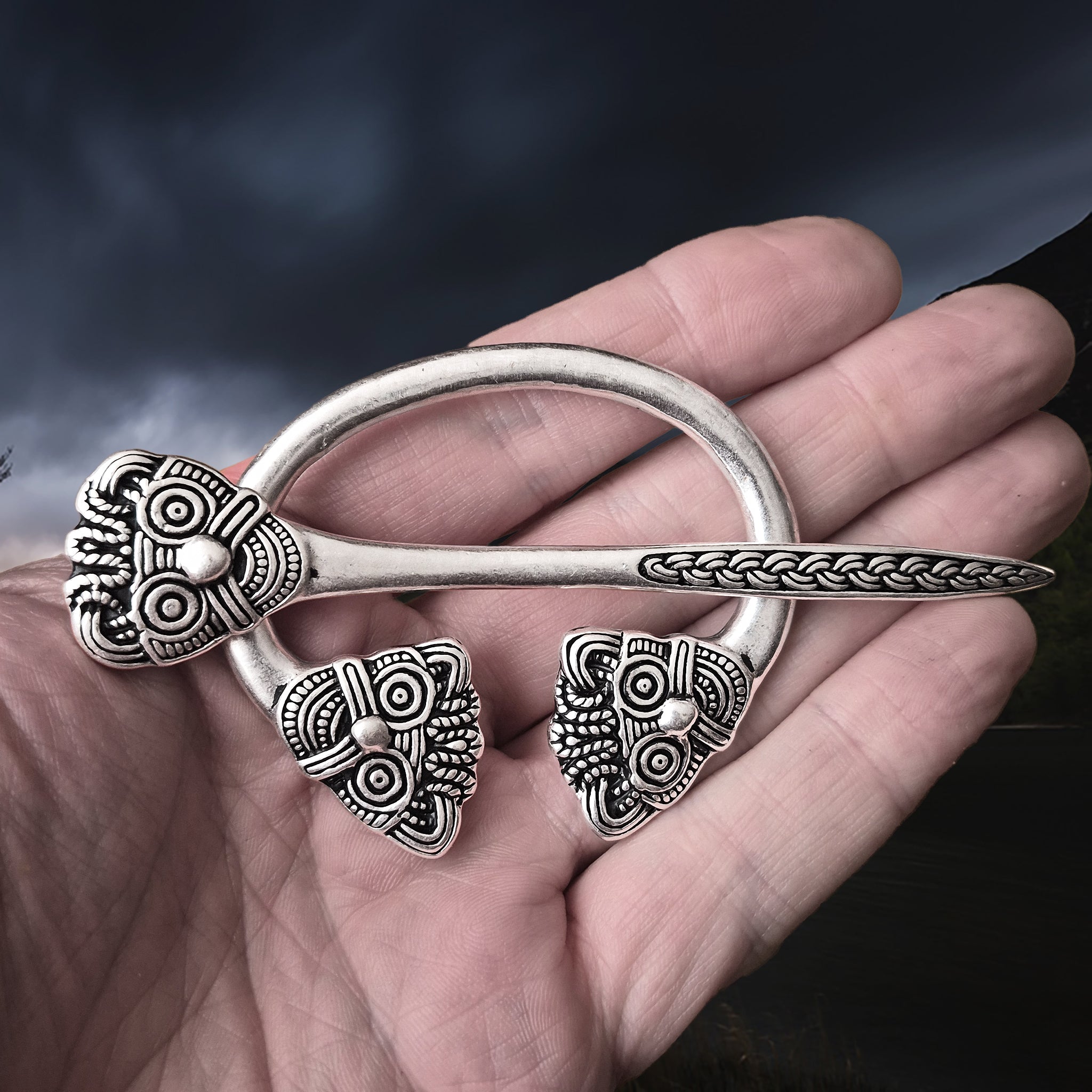 Viking Age Replica - Silver Plated Danish Cloak Pin with Viking Heads on Hand - Straight View