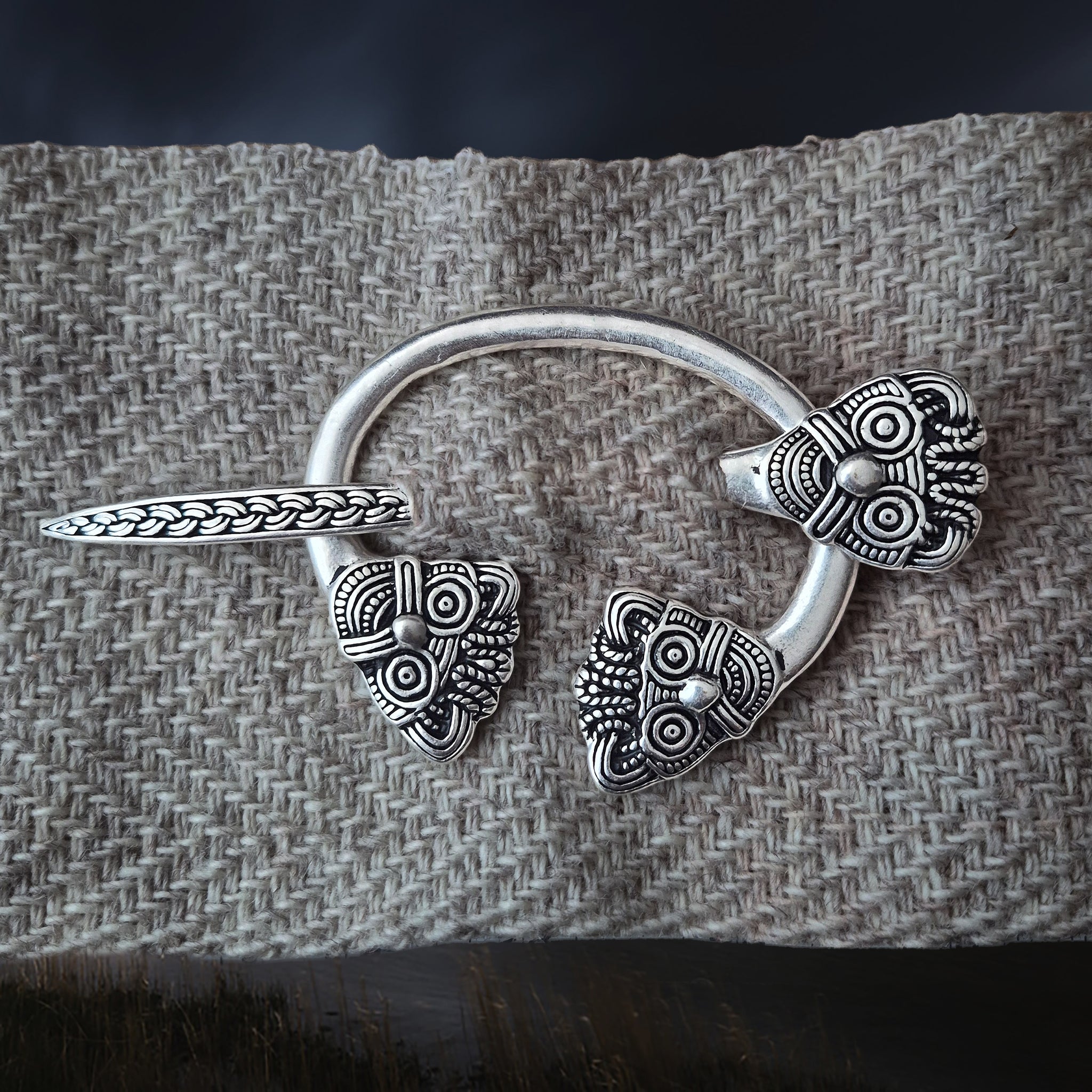 Viking Age Replica - Silver Plated Danish Cloak Pin with Viking Heads Threaded Through Woven Wool