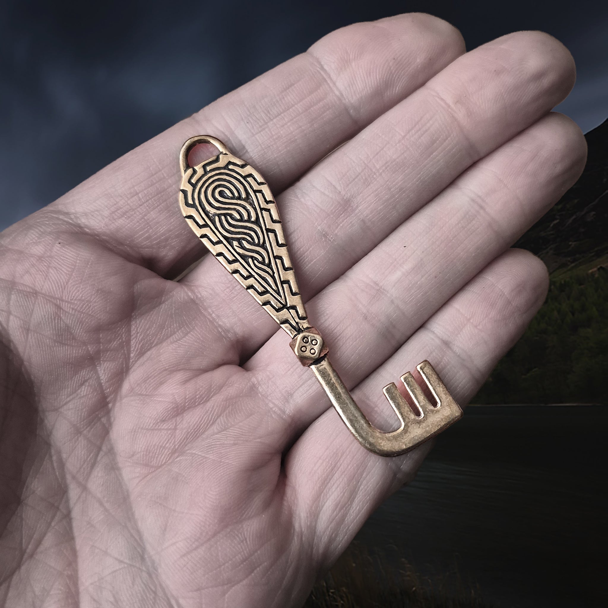 Viking Age Grave Find Replica Bronze Viking Casket Key Pendant on Hand - Angle