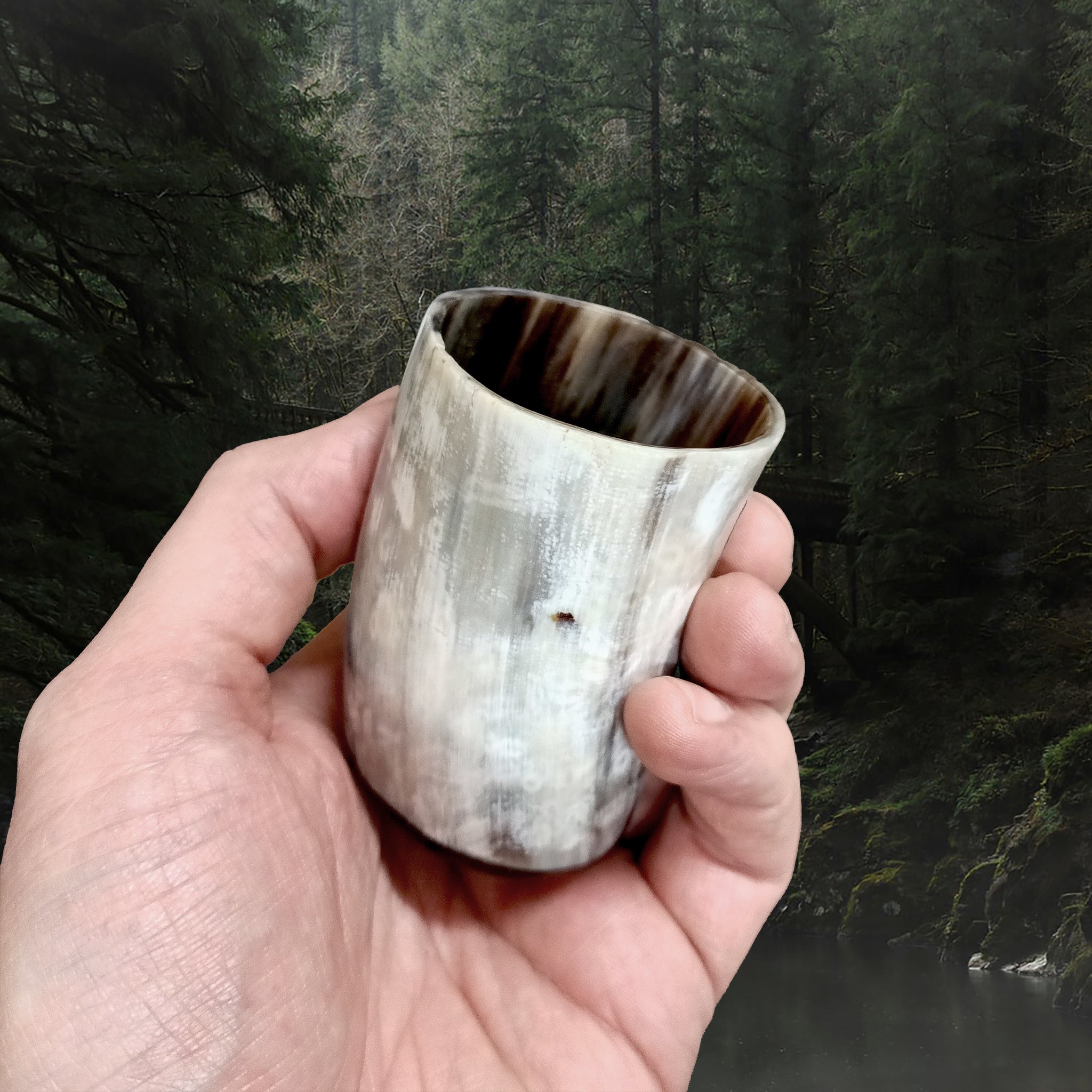 Handmade Cow Horn Dice Shaker / Shot Cup with Resin Base in Hand - Angle View