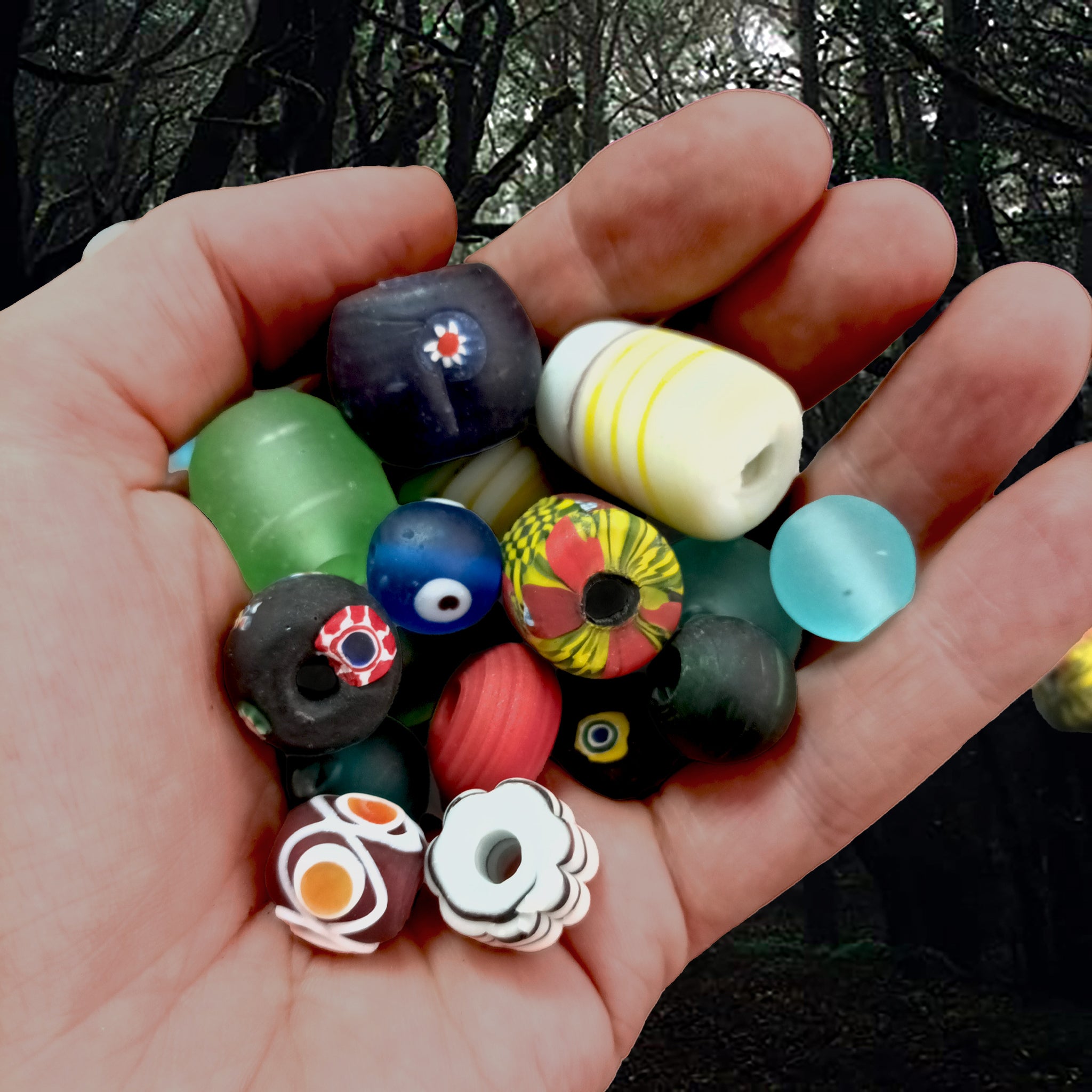Assorted Handmade Glass Viking Beads From Birka in Hand