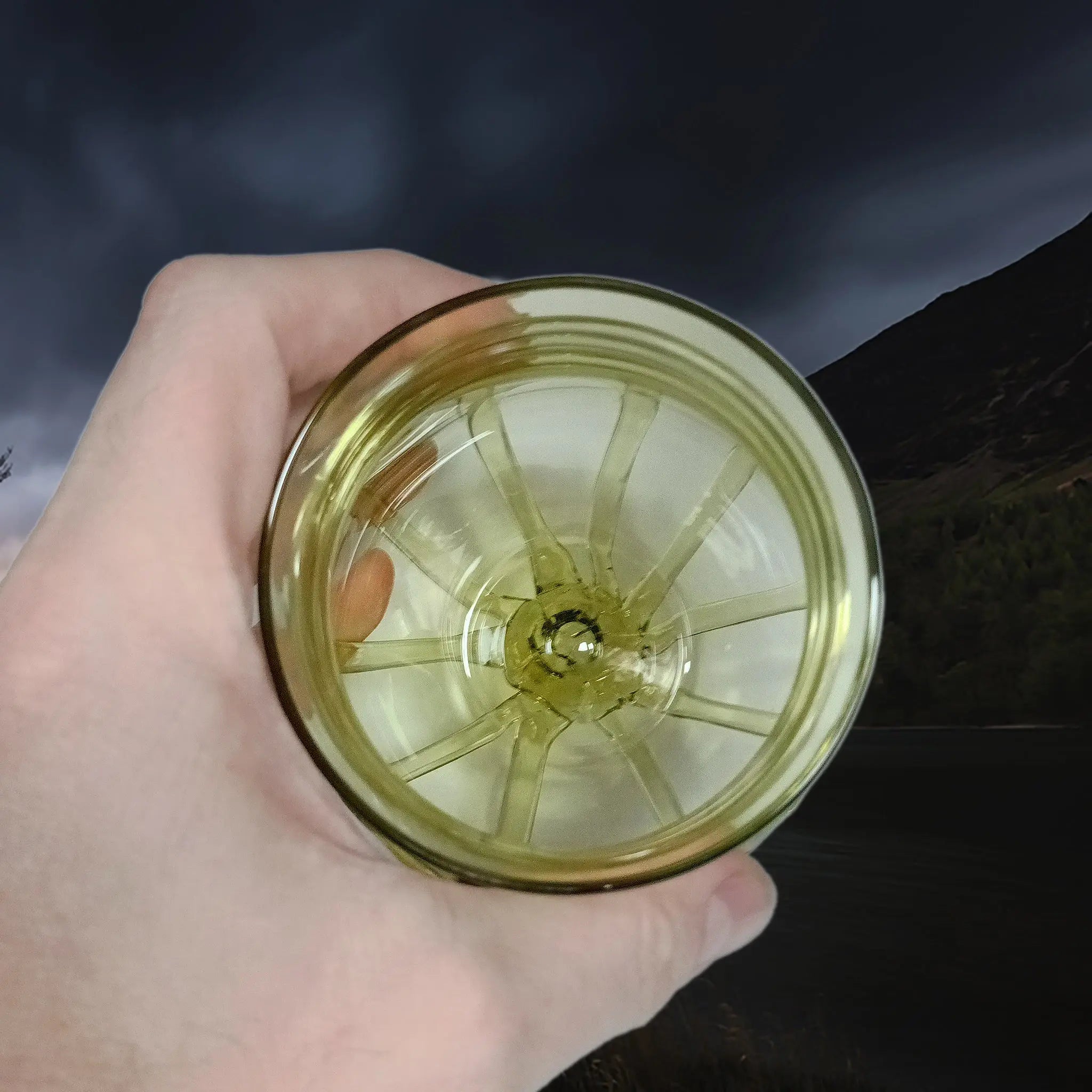Handmade Round Viking Glass From Birka in Hand - Above View, Showing Inside