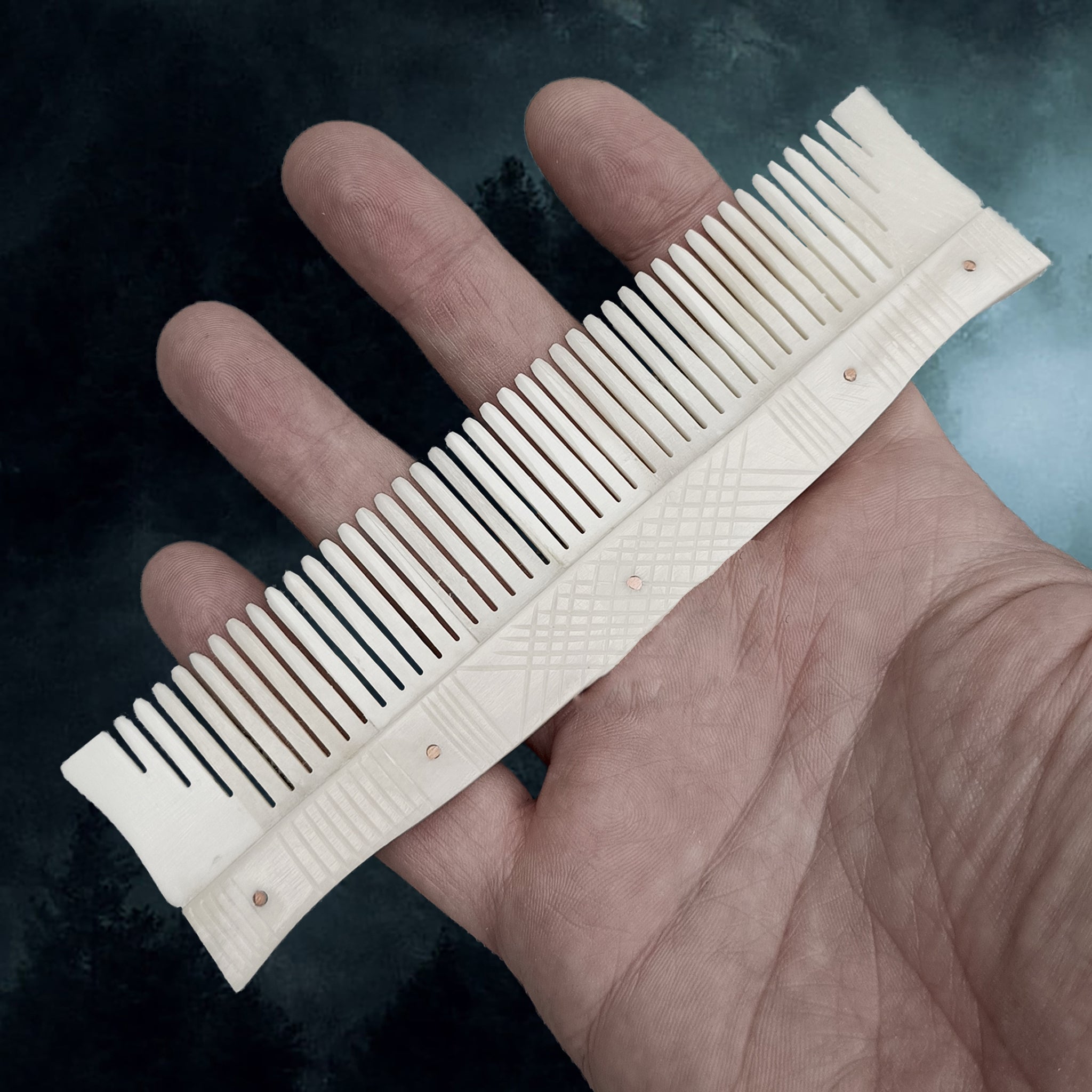 Authentic Handmade Replica Viking Bone Comb with Hand-Carved Decorations on Hand