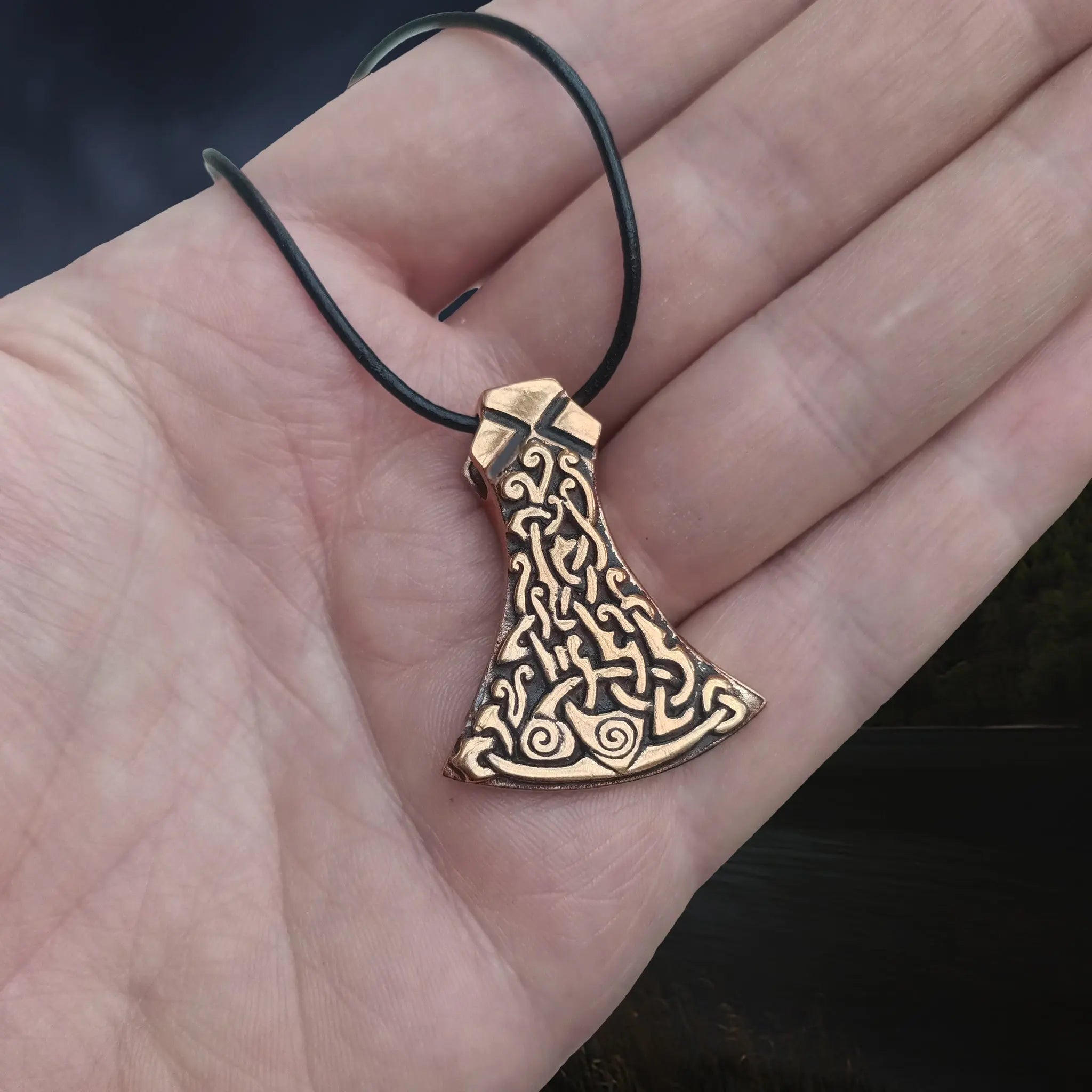Viking Style Axe Head Pendant Based on the Mammen Axe from Denmark on Leather Cord, on Hand