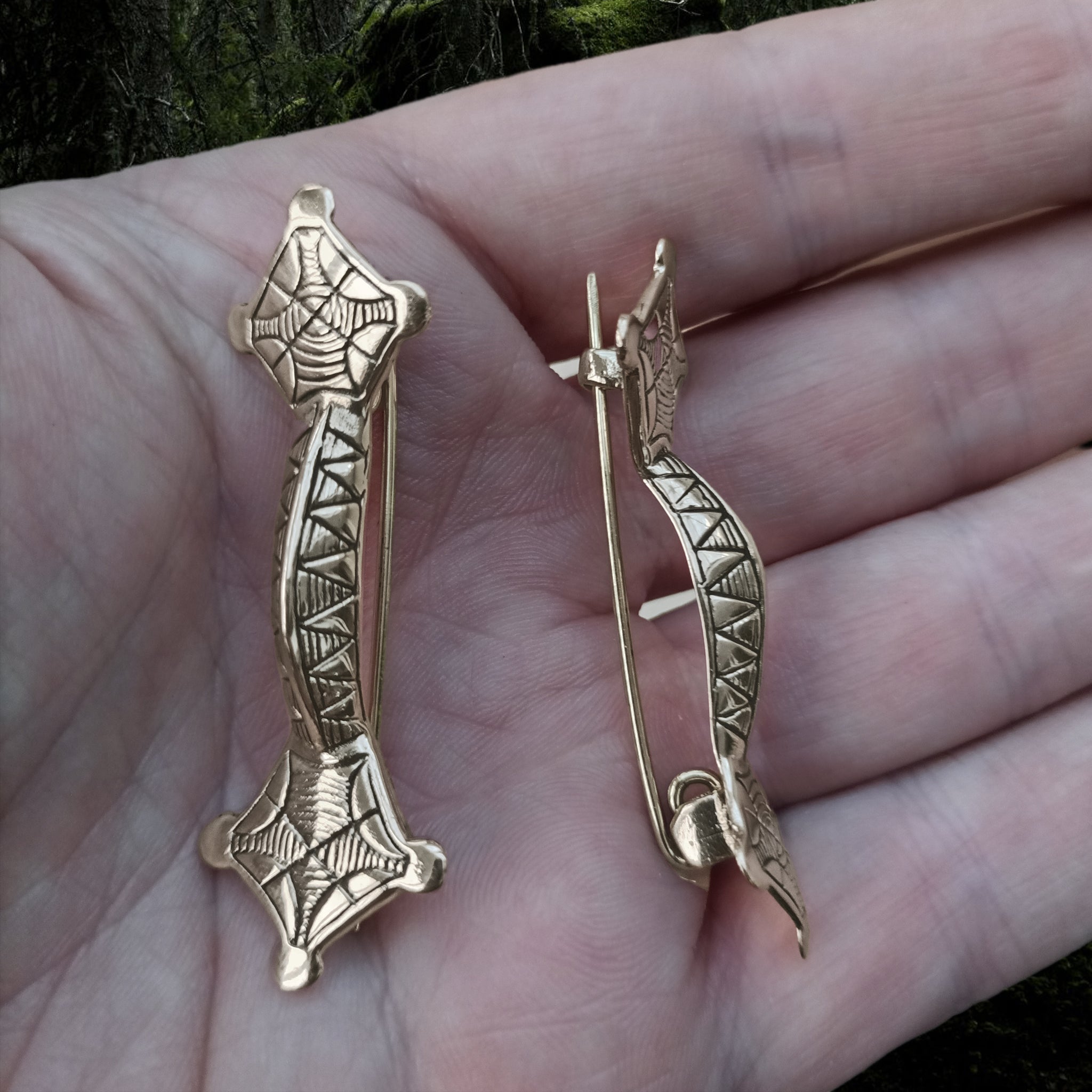 Bronze Viking Mirror Brooches on hand - Front and Side View