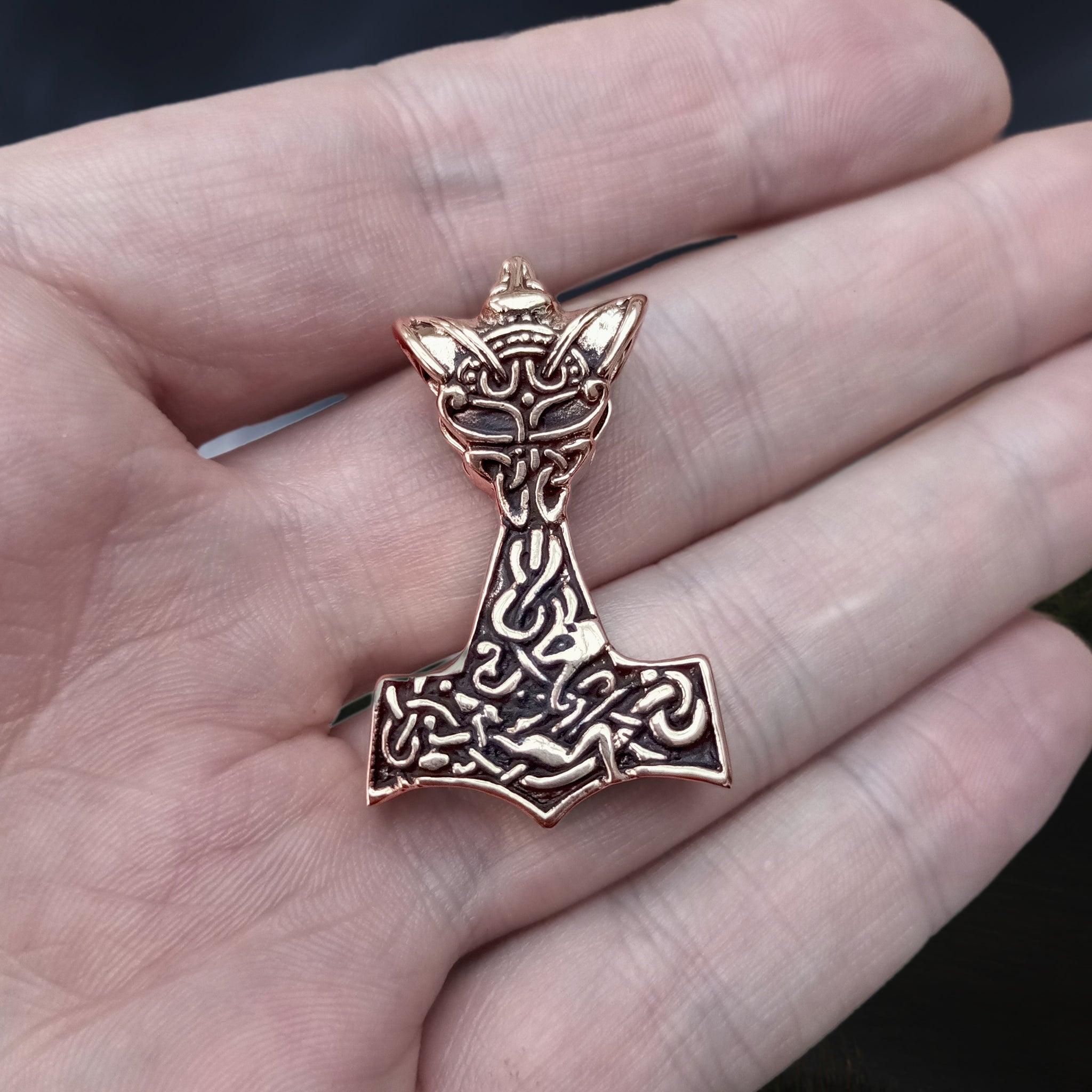 Bronze Wolf Thors Hammer Pendant on Hand