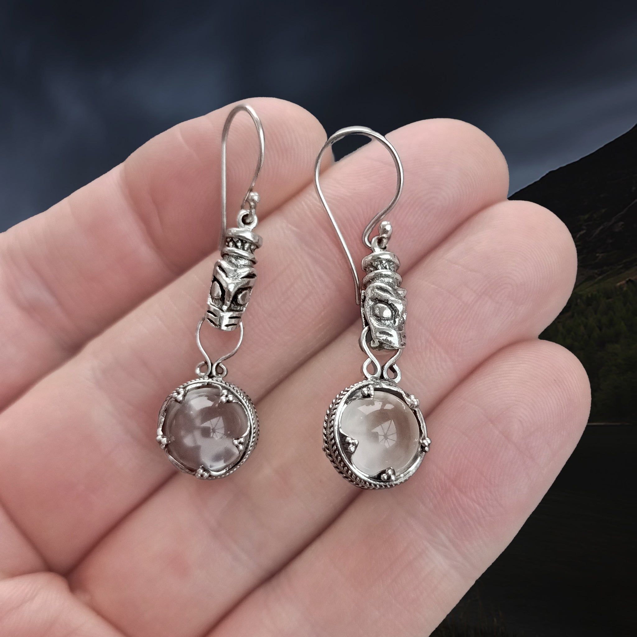 Silver Icelandic Wolf Head Crystal Ball Earrings on Hand