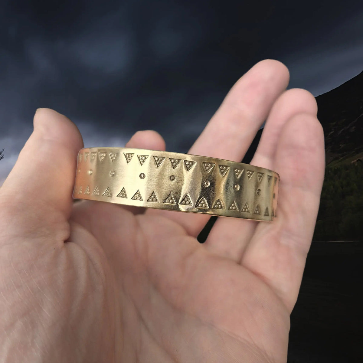 Brass Replica Viking Bracelet from Birka with Embossed Design in Hand