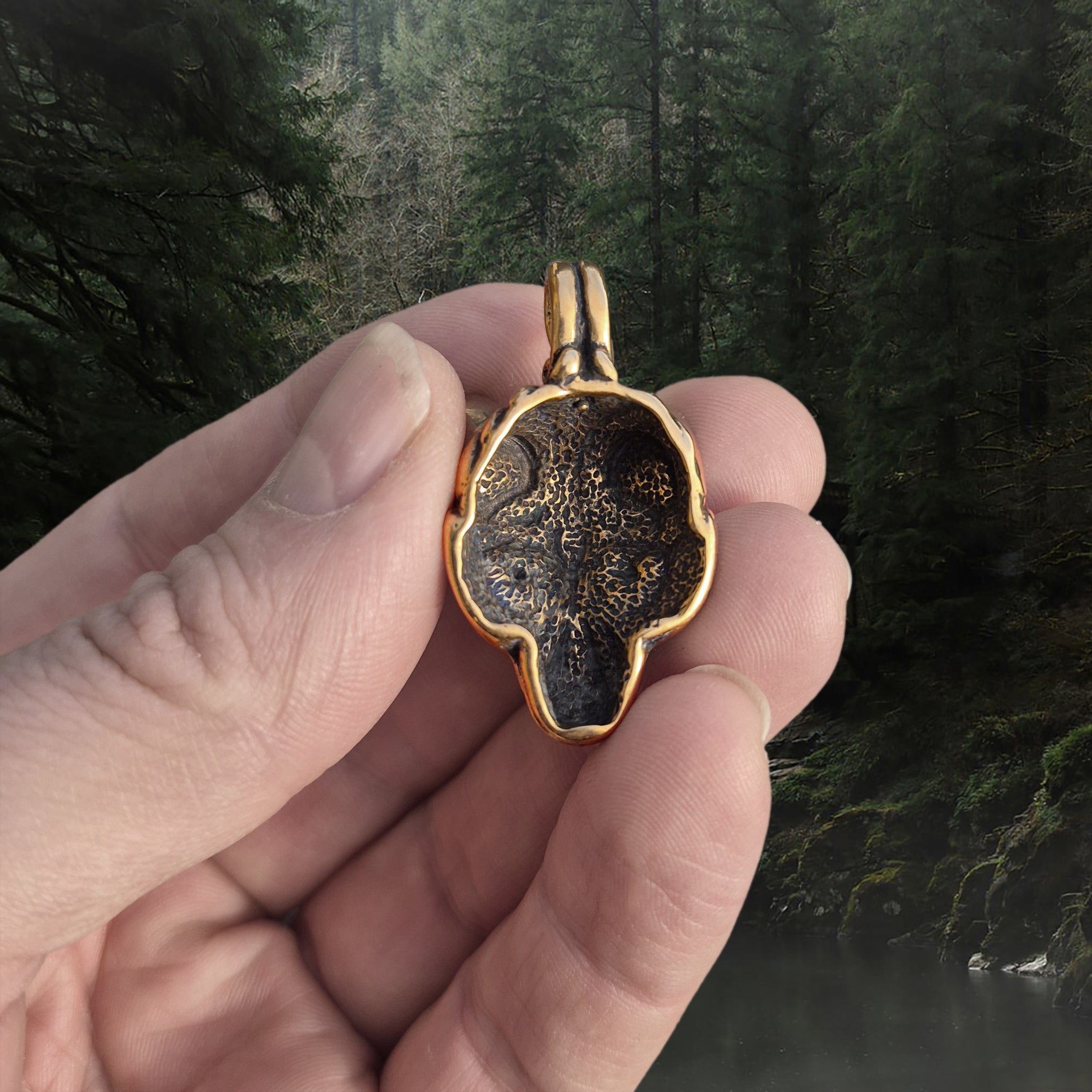 Bronze Borre Style Viking Wolf Head Pendant in Hand - Back View