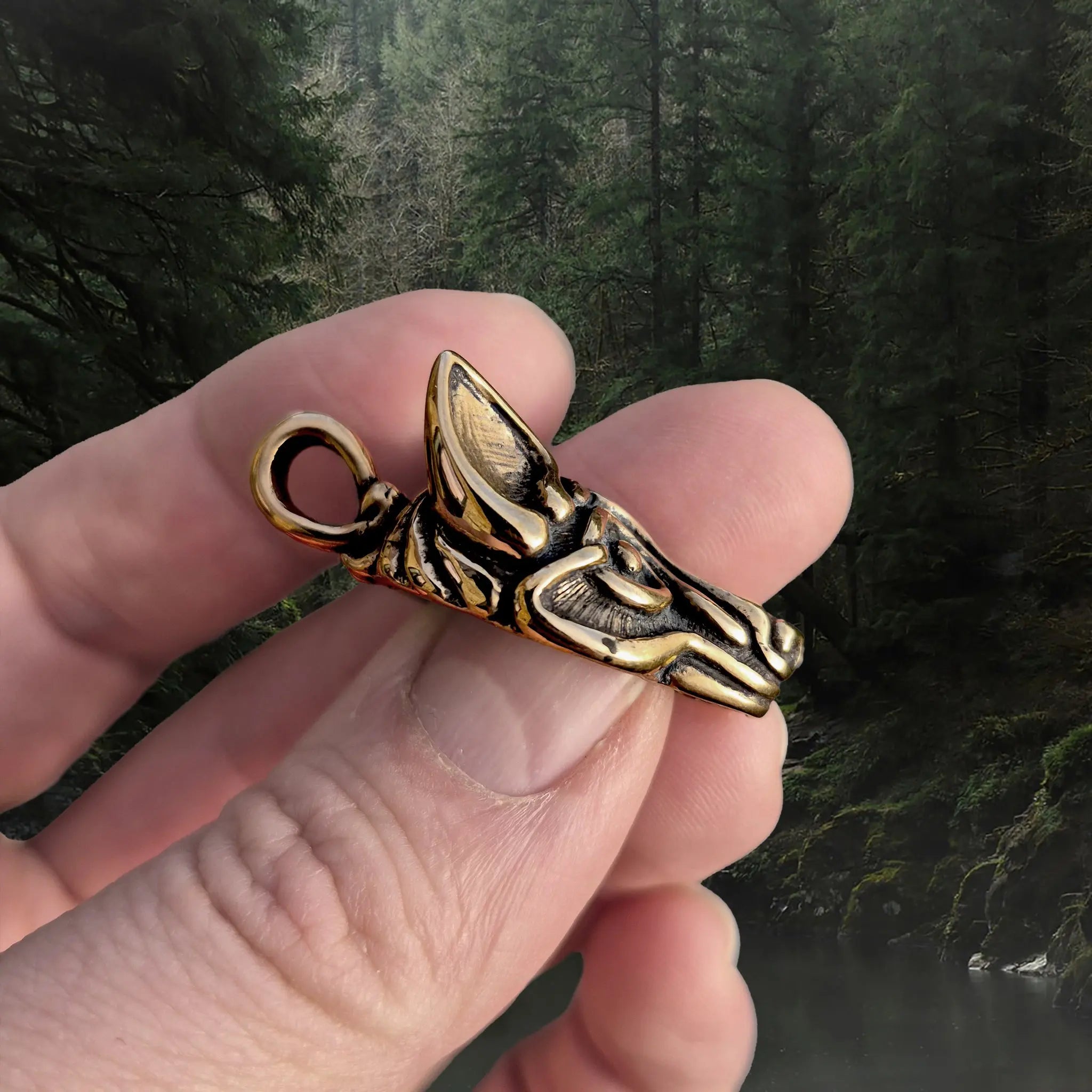 Bronze Borre Style Viking Wolf Head Pendant in Hand- Side View