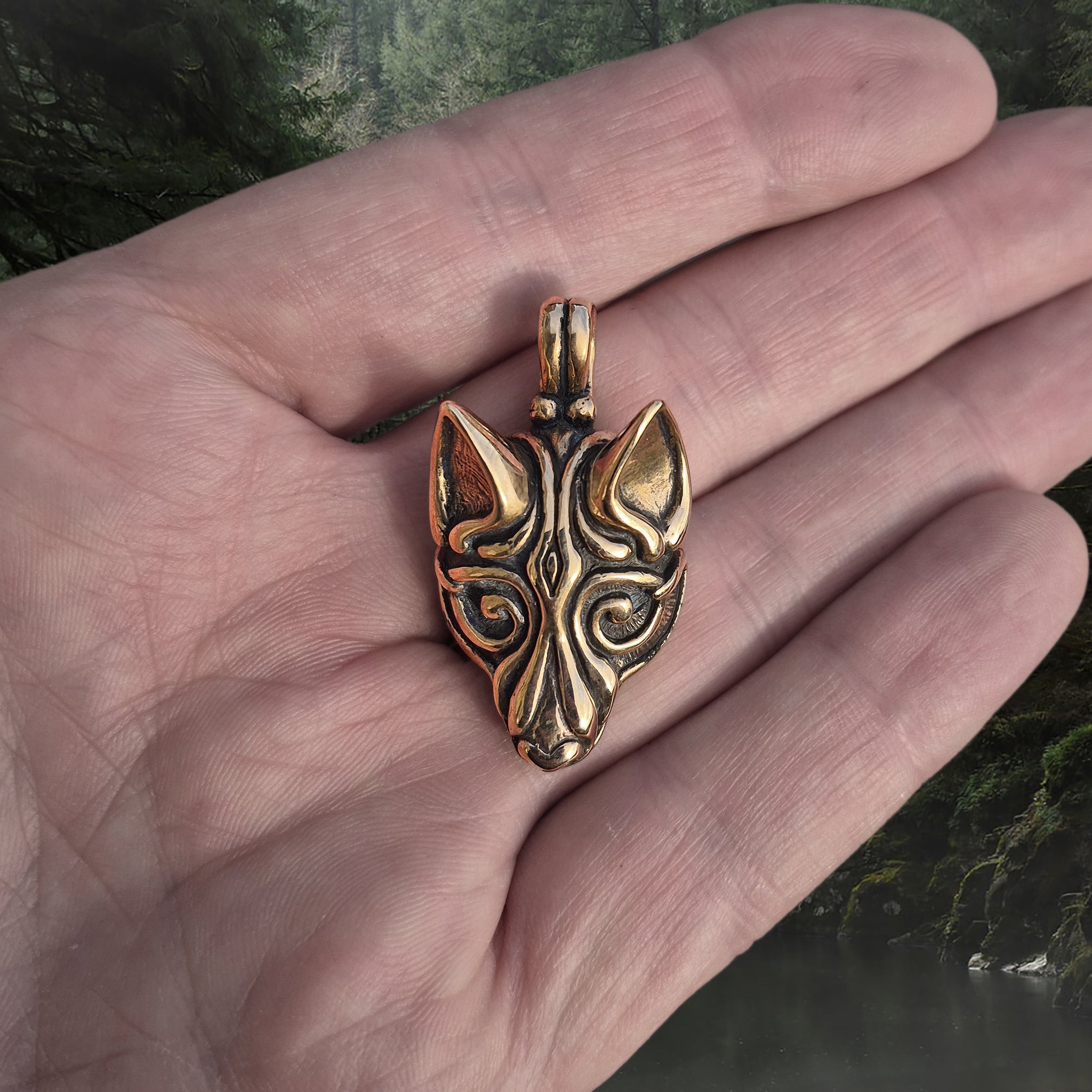 Bronze Borre Style Viking Wolf Head Pendant on Hand