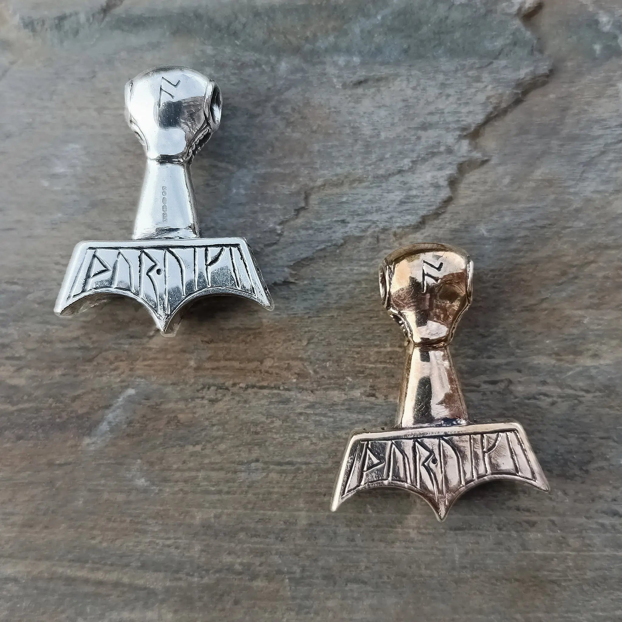Ferocious Beast Thors Hammer Pendants on Rock - Silver and Bronze - Back View