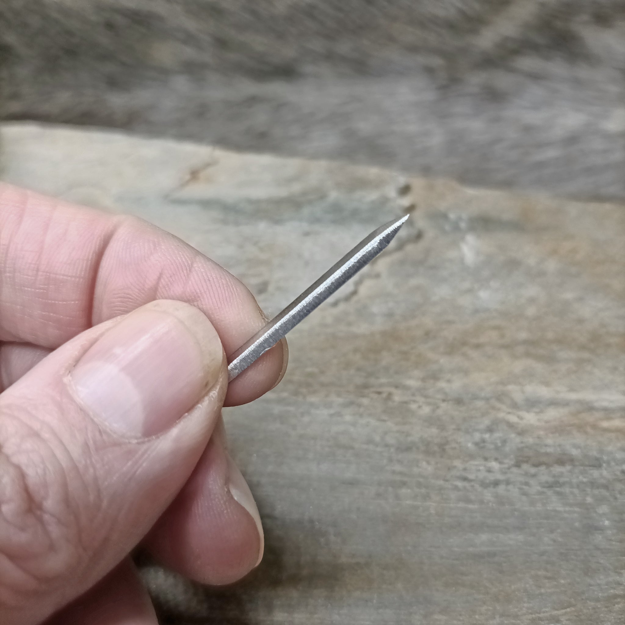 Diamond Cut Awl Blade in Hand