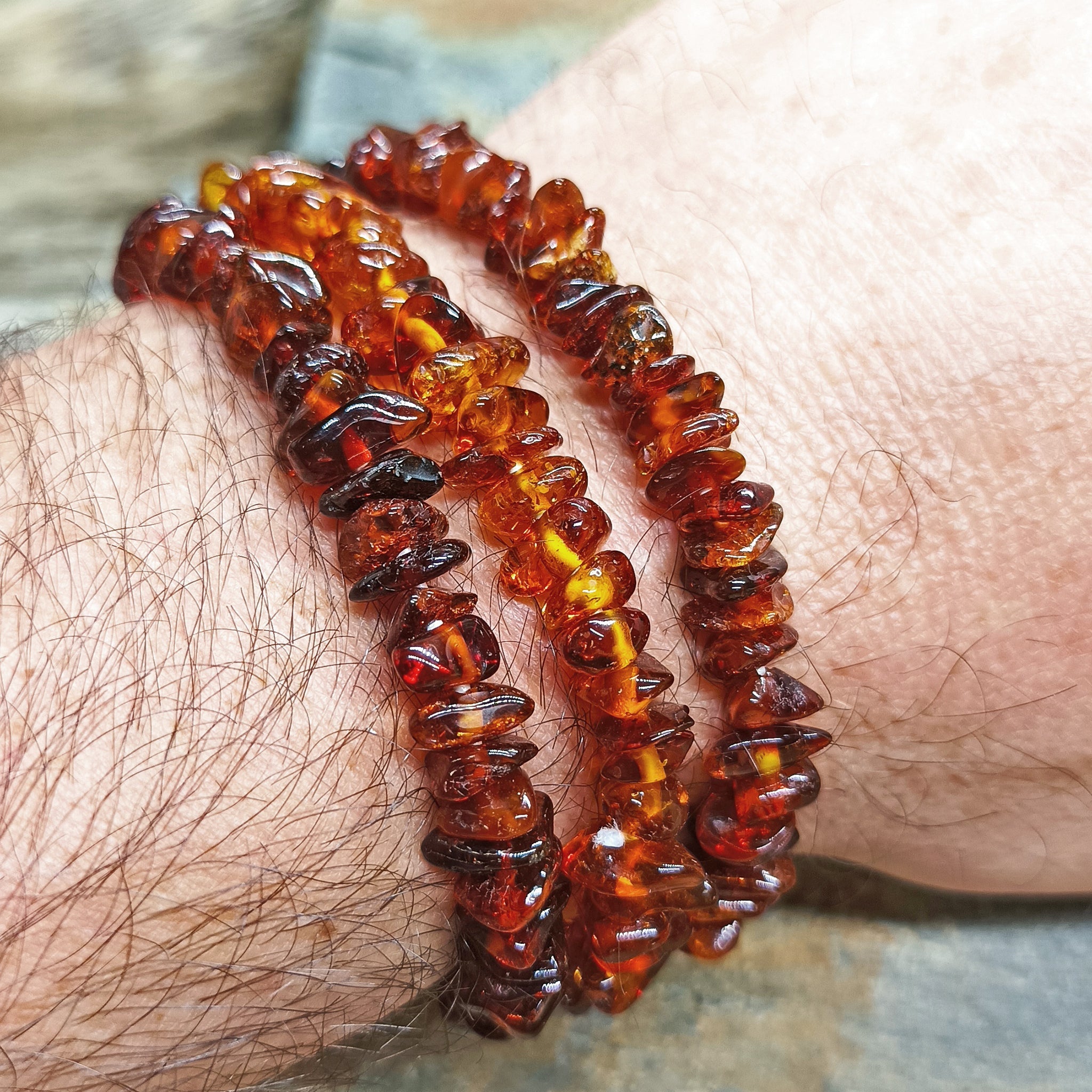 Polished Amber Chip Bracelets on Wrist