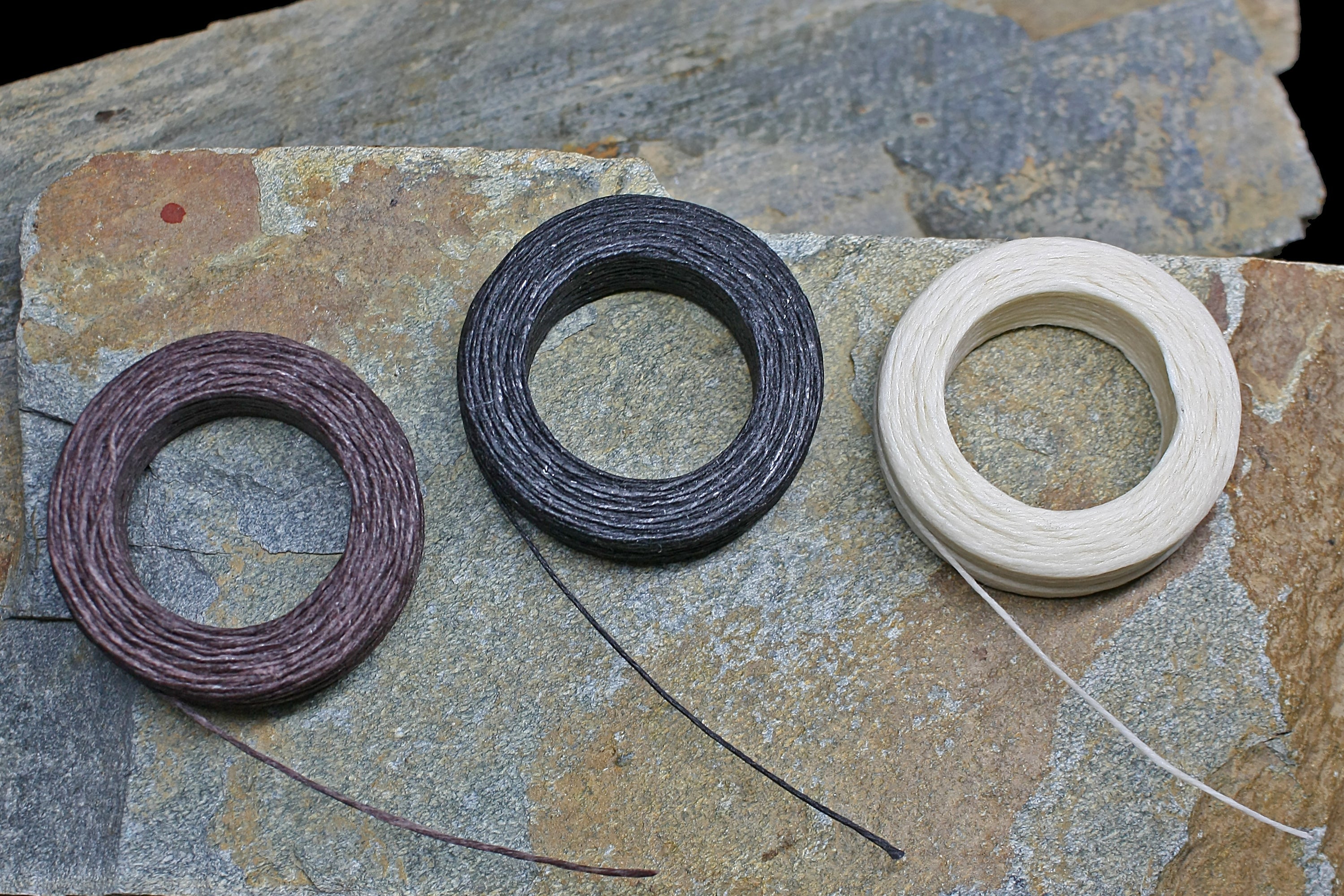 Waxed Linen Thread Reels on Rock