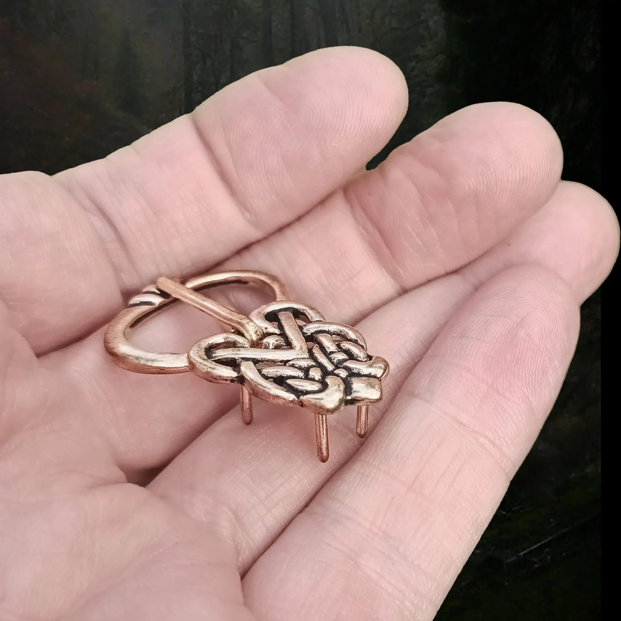 Bronze Ringerike Style Knotwork Viking Buckle on Hand - Side Angle View
