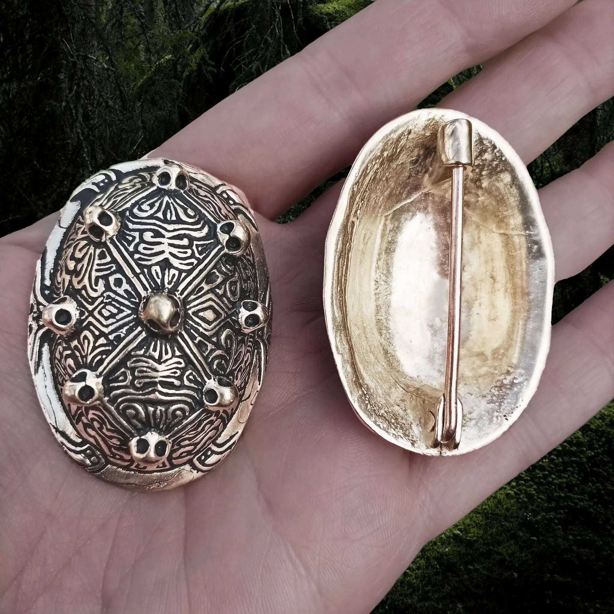 Bronze Viking Tortoise Brooches from Aland in Hand - Front and Back