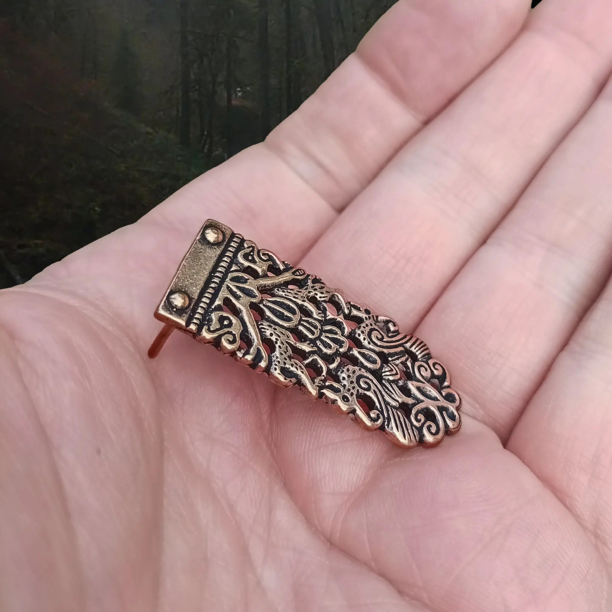 Bronze Viking / Saxon Strap End from Winchester on Hand - Side Angle View