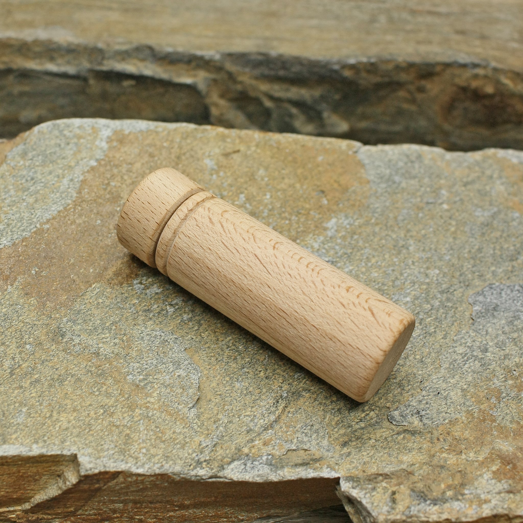 Small Wooden Viking / Medieval Needlecase on Rock