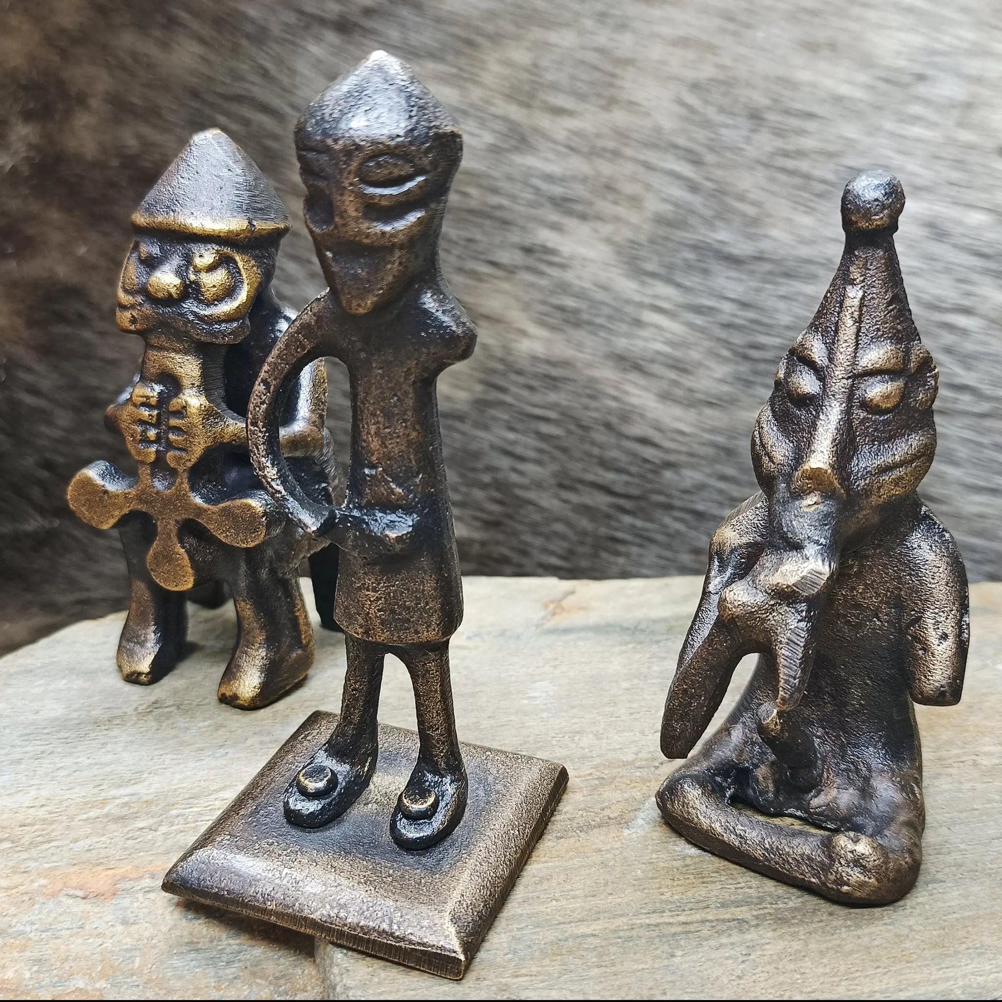 Bronze Norse God Statues Set on Rock - Side Angle View