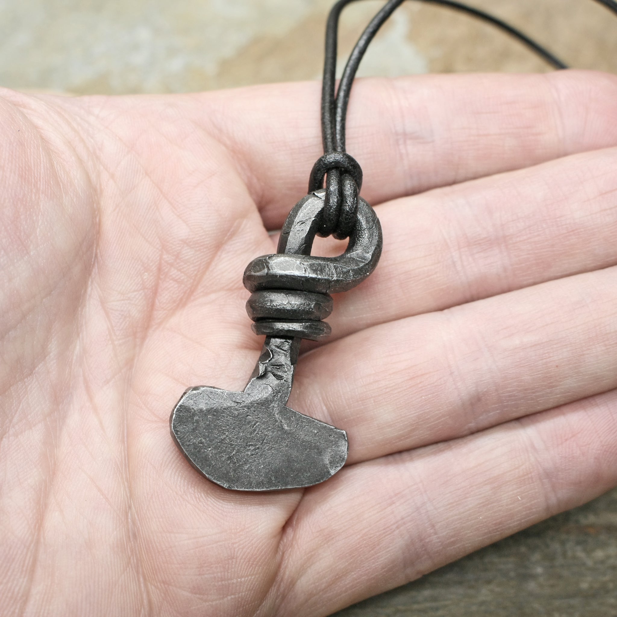 Iron Viking Thors Hammer Pendant From Birka on Thong on Hand