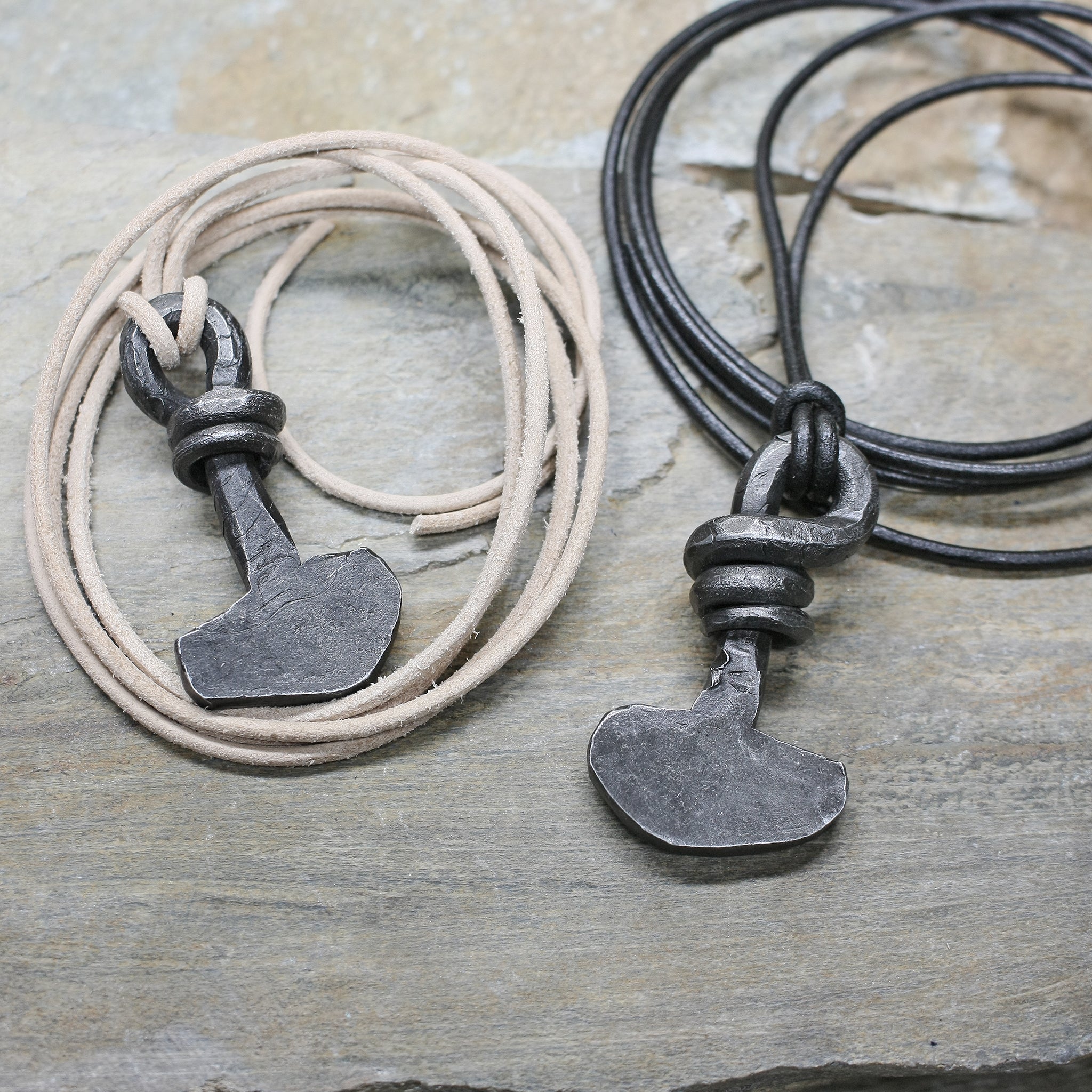 Iron Viking Thors Hammer Pendants From Birka on Thongs on Rock