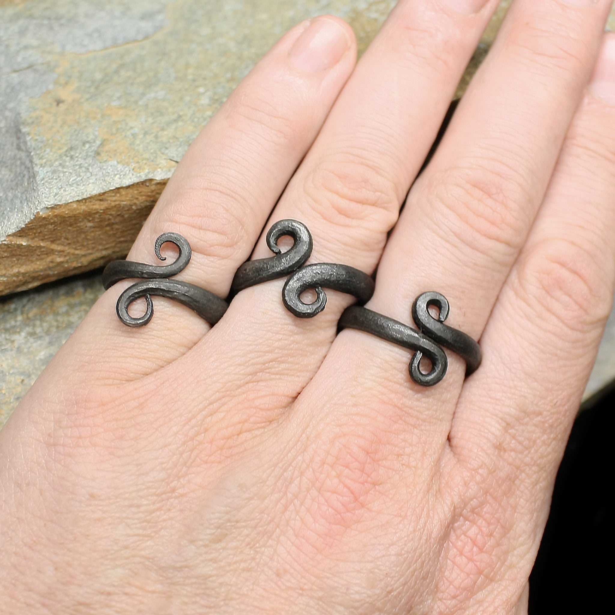 Hand-Forged Iron Viking Rings on Hand