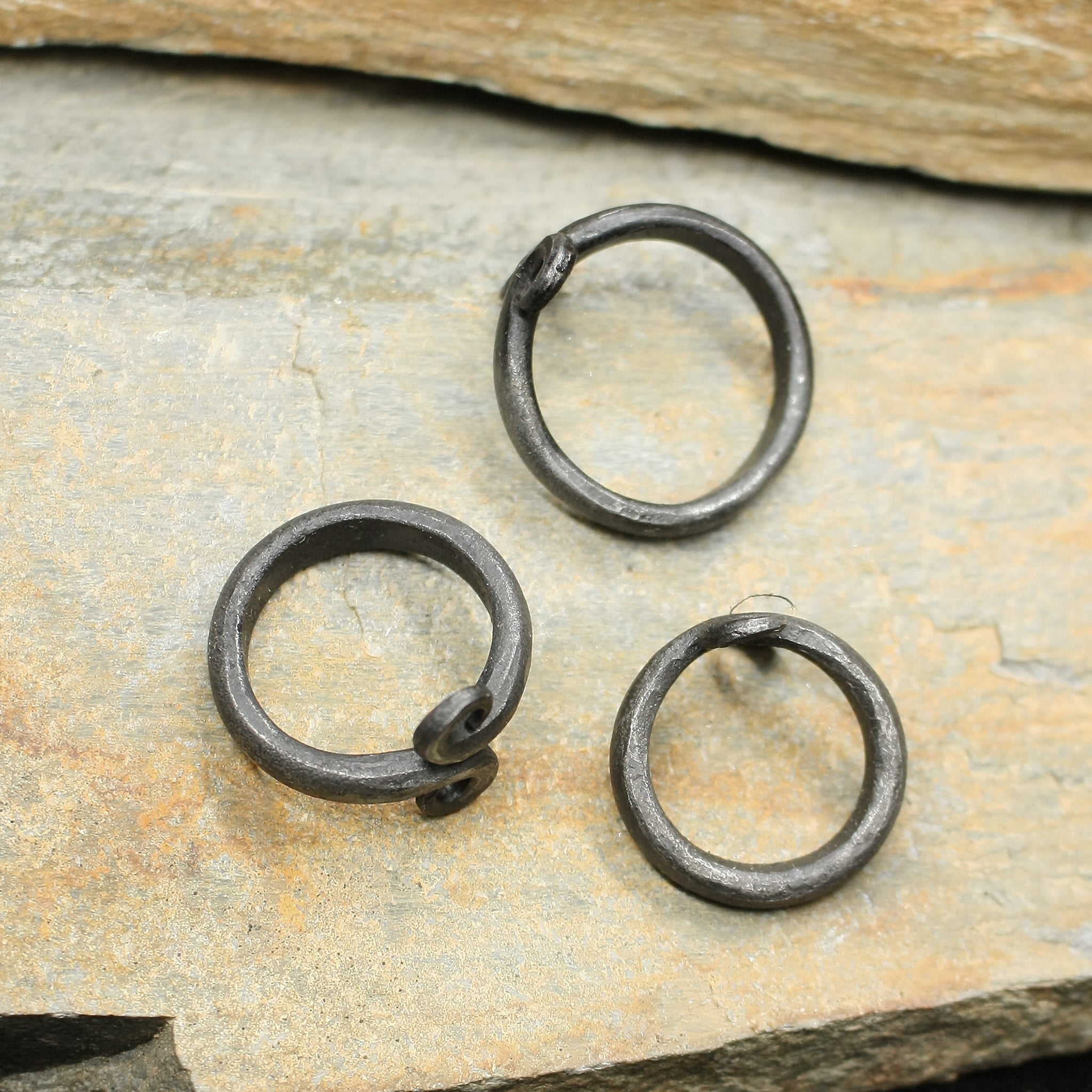 Hand-Forged Iron Viking Rings on Rock - 3 Sizes
