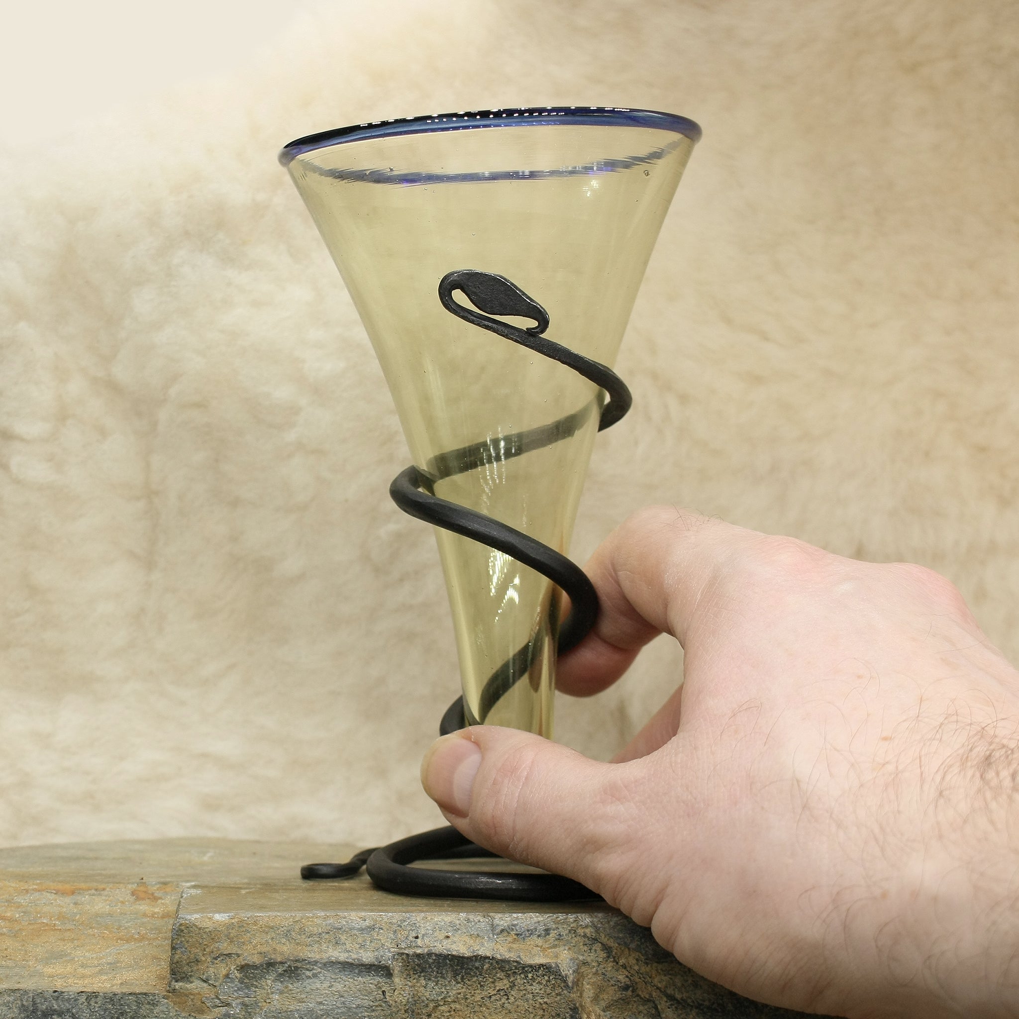 Glass Viking Cone Beaker with Blue Rim, Iron Stand on Rock with Hand