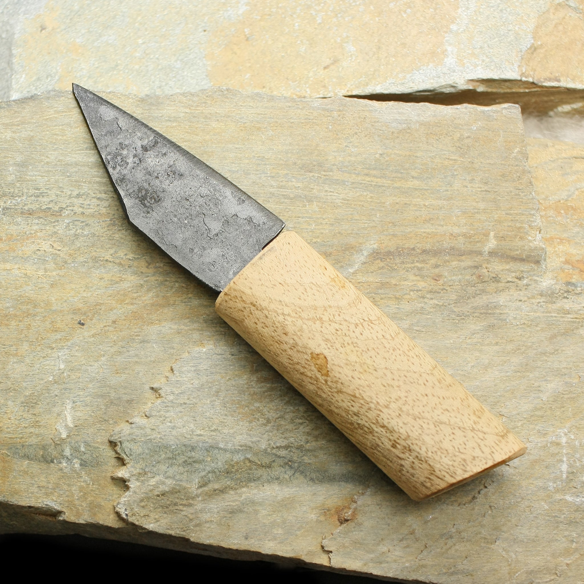 Small Wooden Handle Viking Knife on Rock