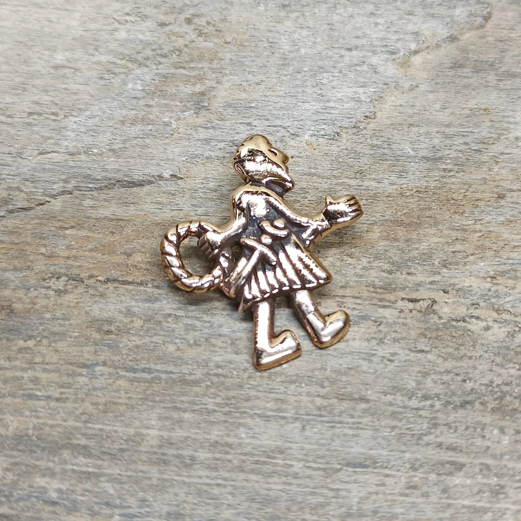 Bronze Fafnir Viking Pendant on Rock - Front Angle View