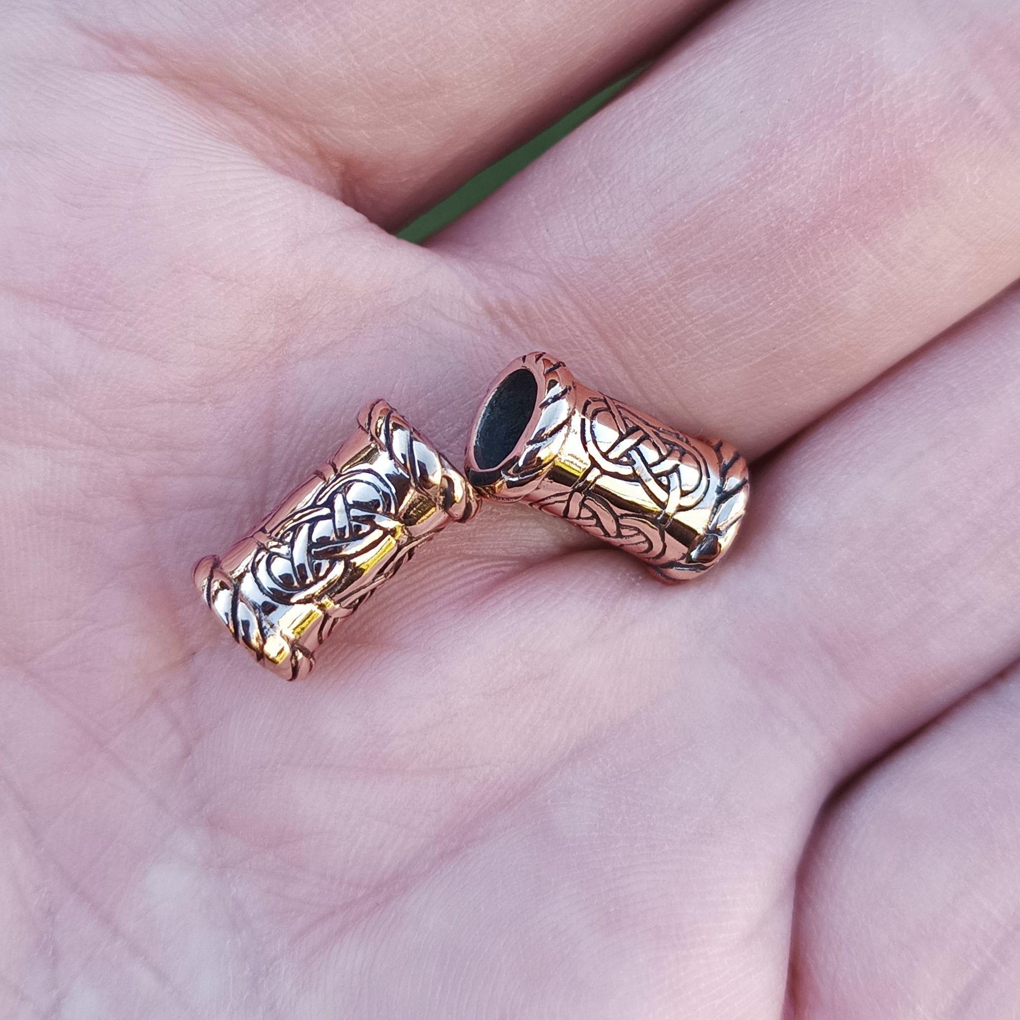 Small Knotwork Viking Beard Rings on Hand in Bronze