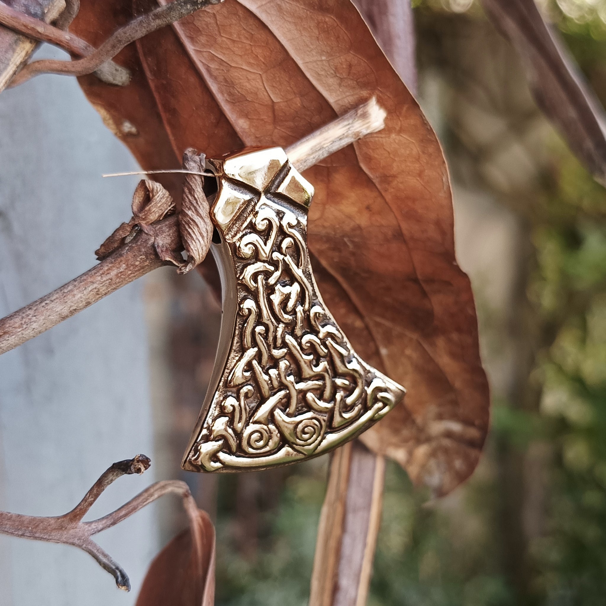 Bronze Mammen Axe Head Pendant on Tree - Angle View