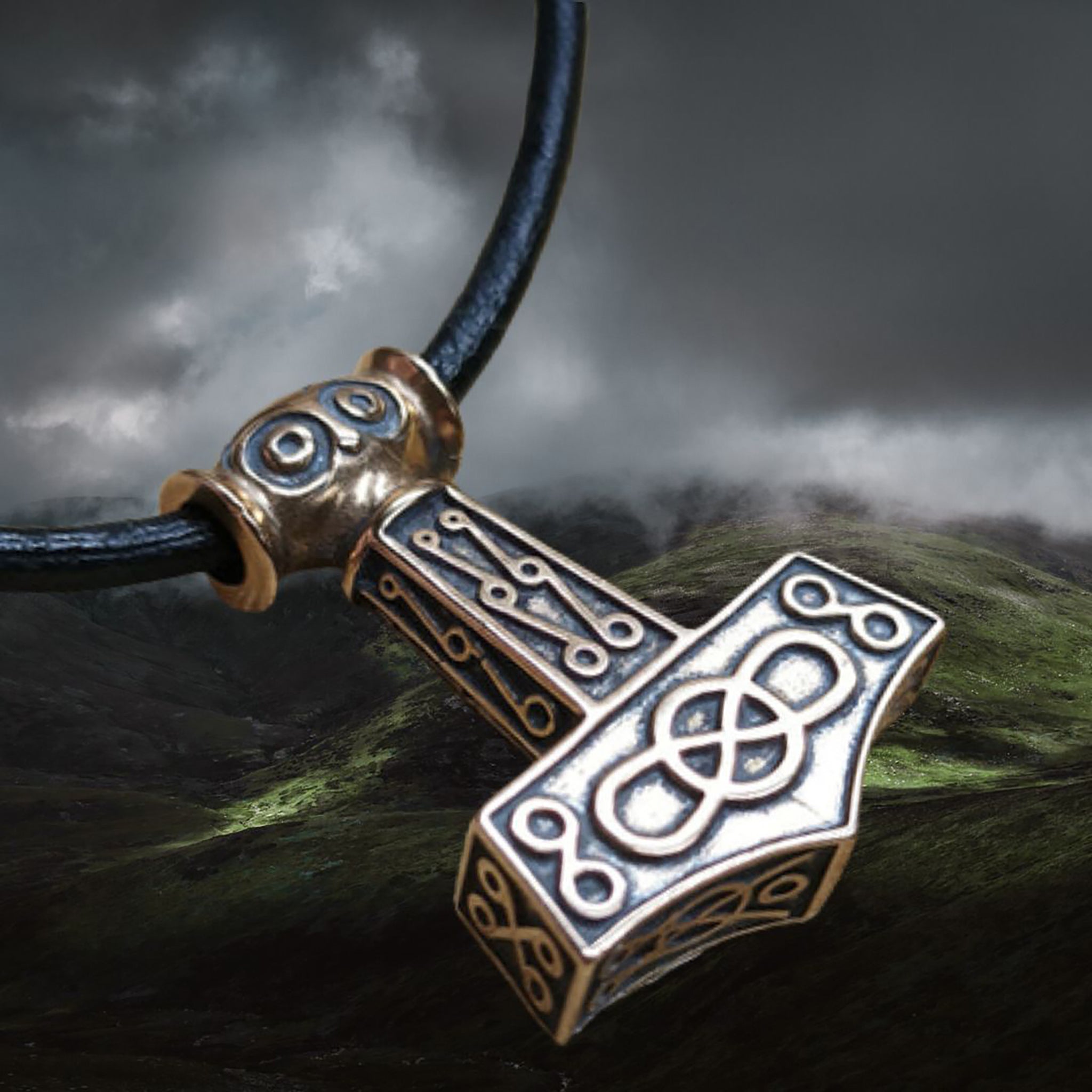 Bronze Odeshög Thors Hammer Pendant on Mystical Mountains Background