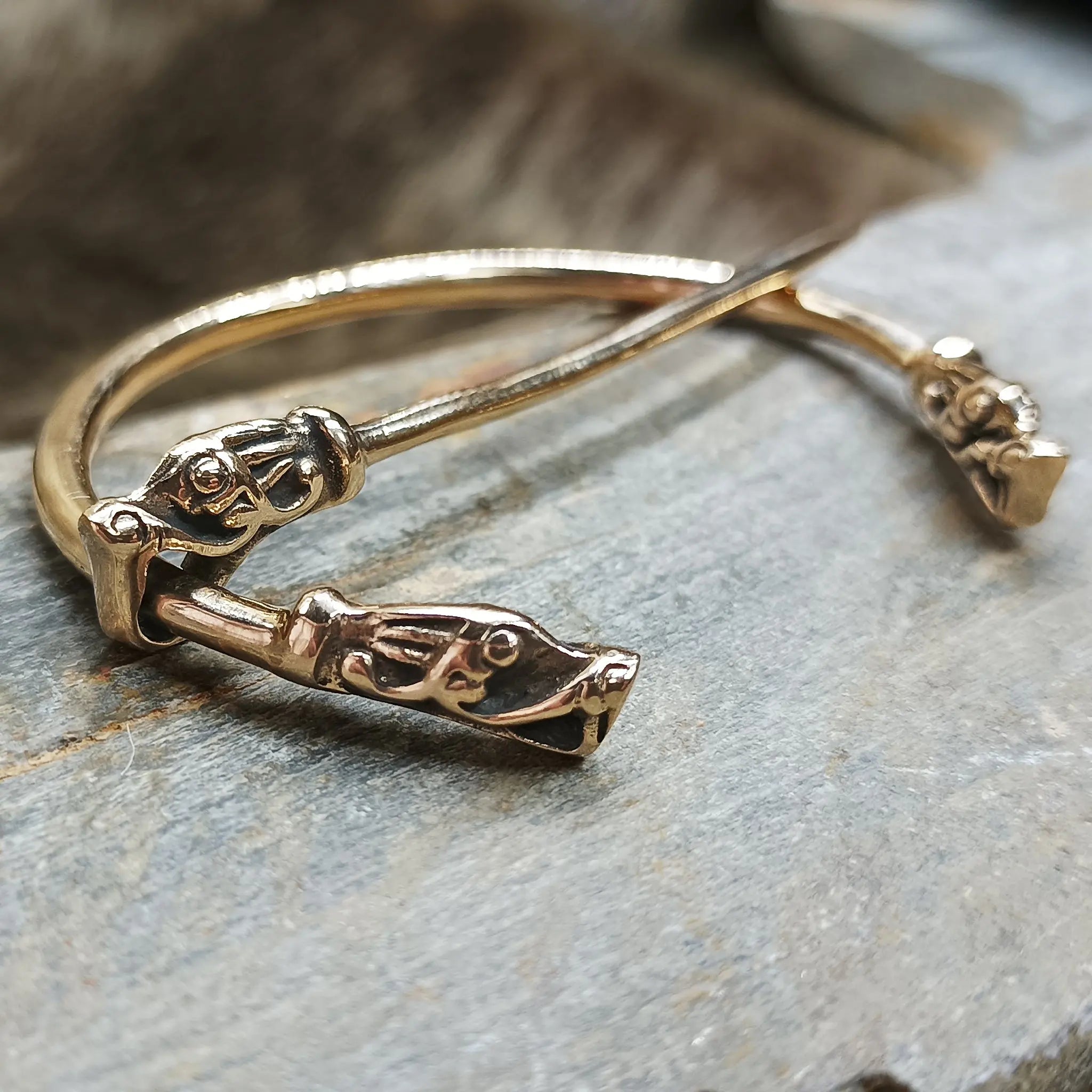 Bronze Penannular Brooch with Gotlandic Dragon Heads on Rock - Side View