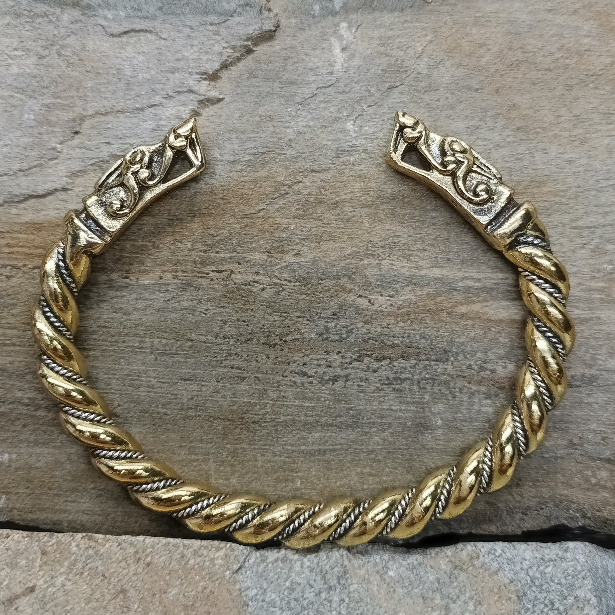 Twisted Bronze and Silver Bracelet With Gotlandic Dragon Heads on Rock
