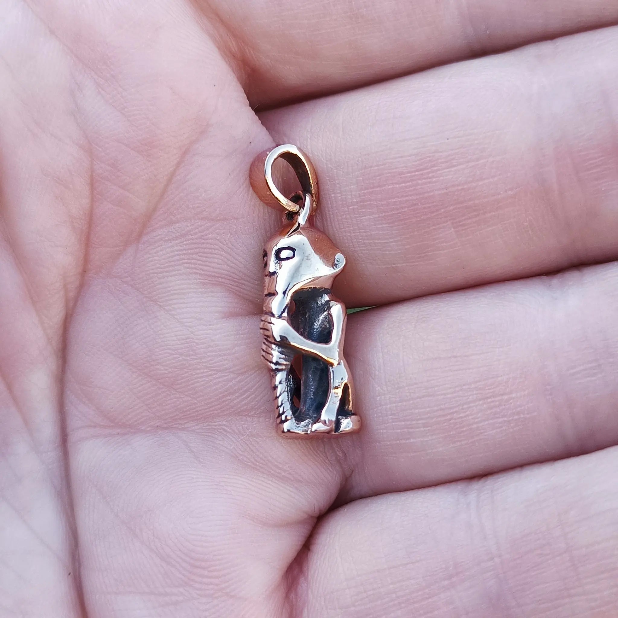 Bronze Replica Thor Pendant From Lund on Hand - Side View