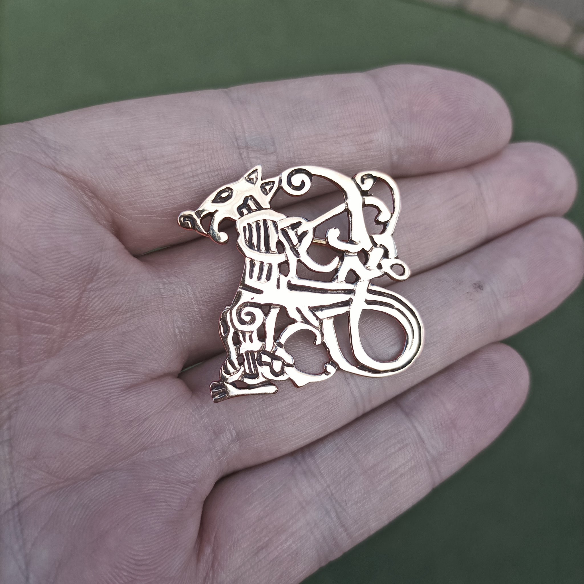 Bronze Jelling Wolf Viking Brooch on Hand