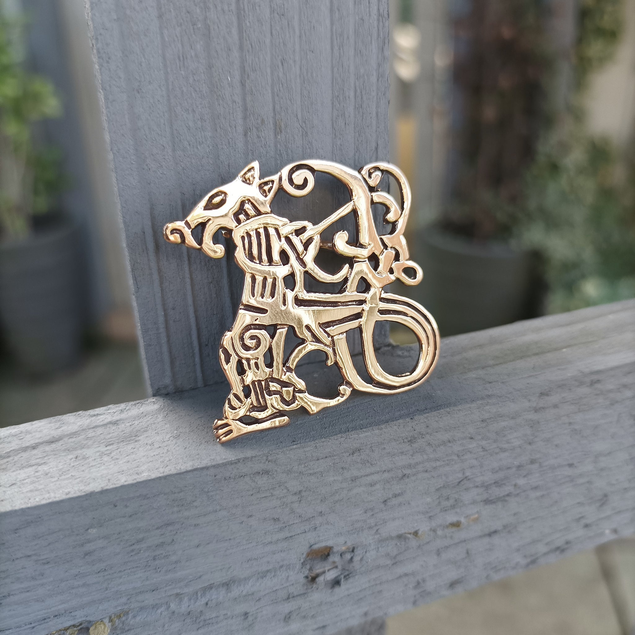 Bronze Jelling Wolf Viking Brooch on Fence