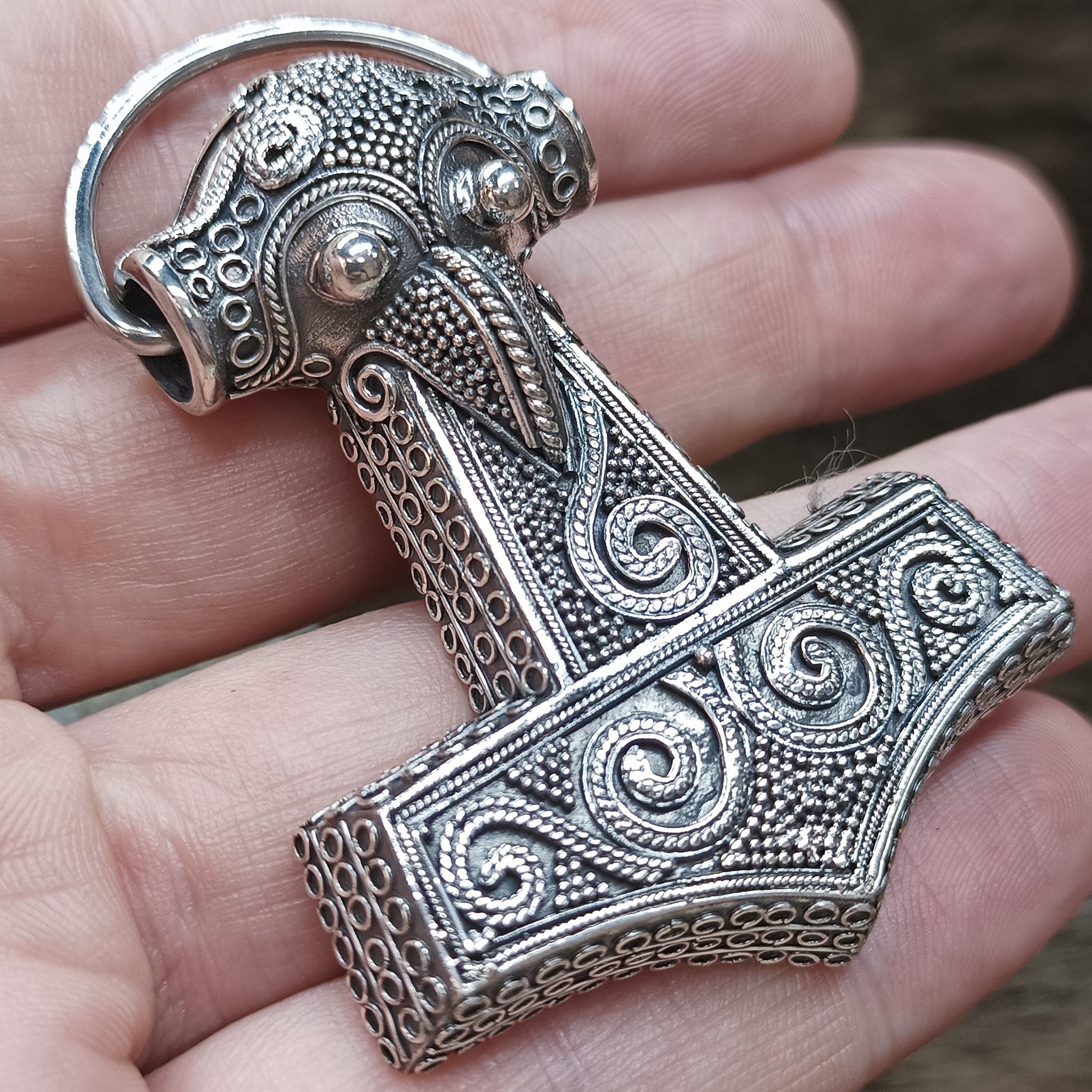 Large Silver Filigree Thors Hammer Pendant Replica from Kabara with Ring - On Hand - Angle View