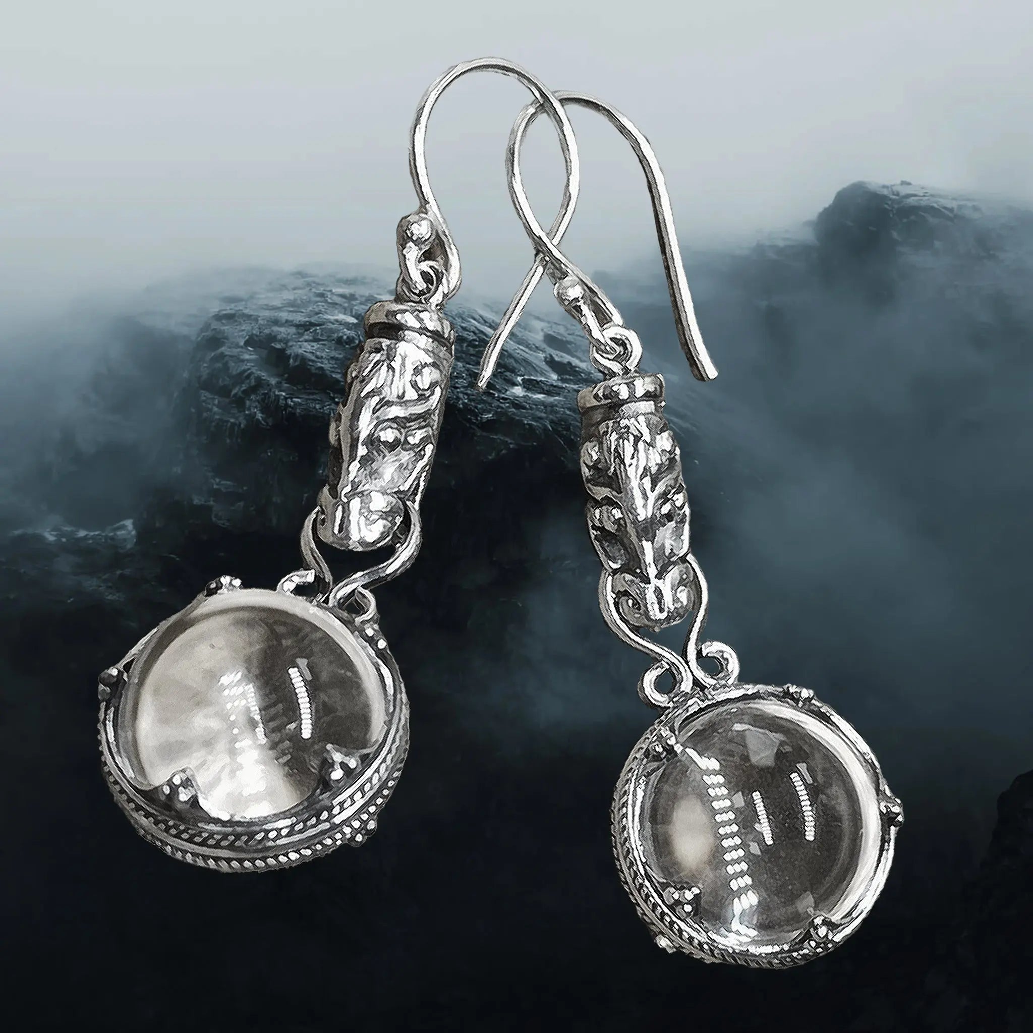 Silver Dragon Head Gotlandic Crystal Ball Earrings on Icy Ridge Background