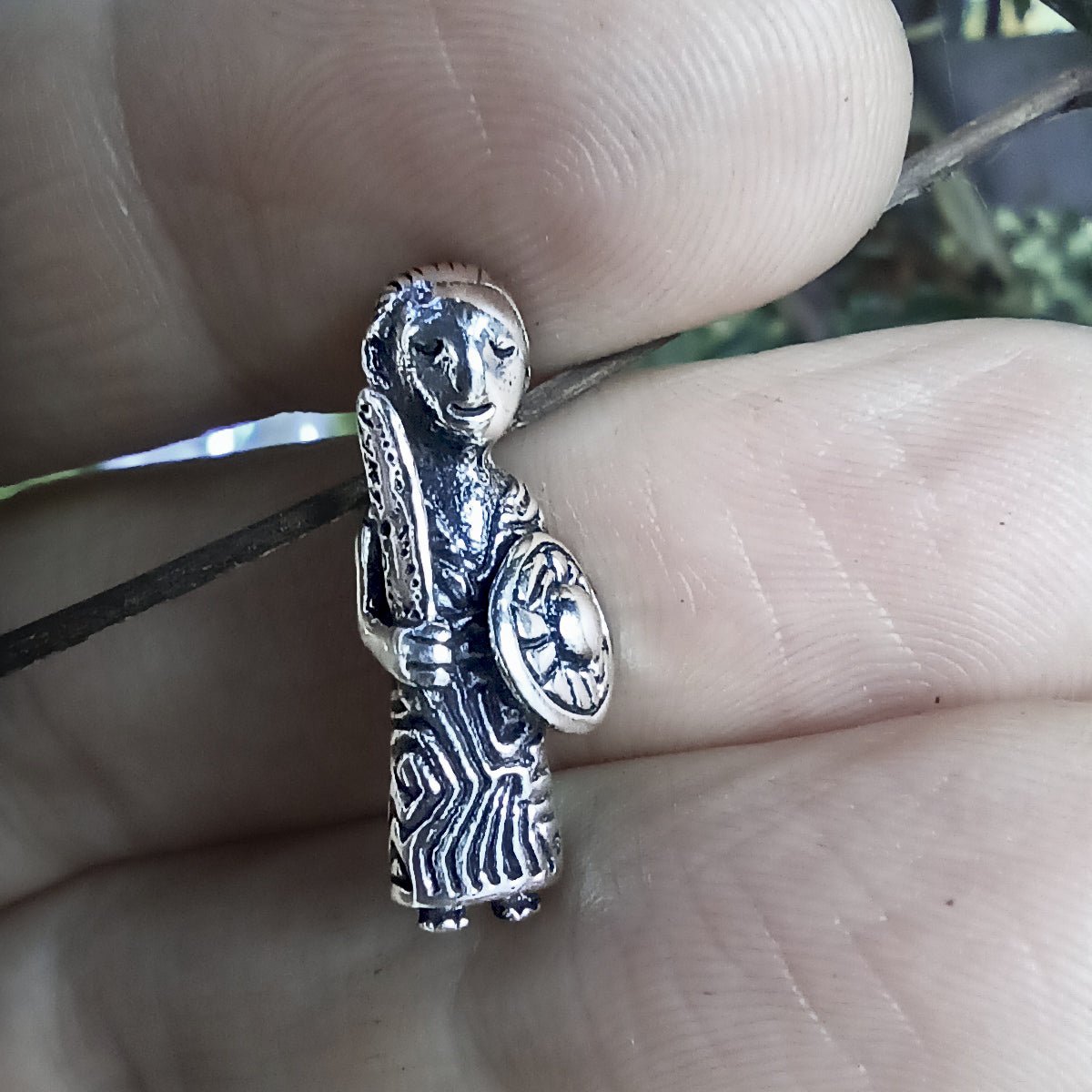Small Silver Valkyrie Pendant in Hand