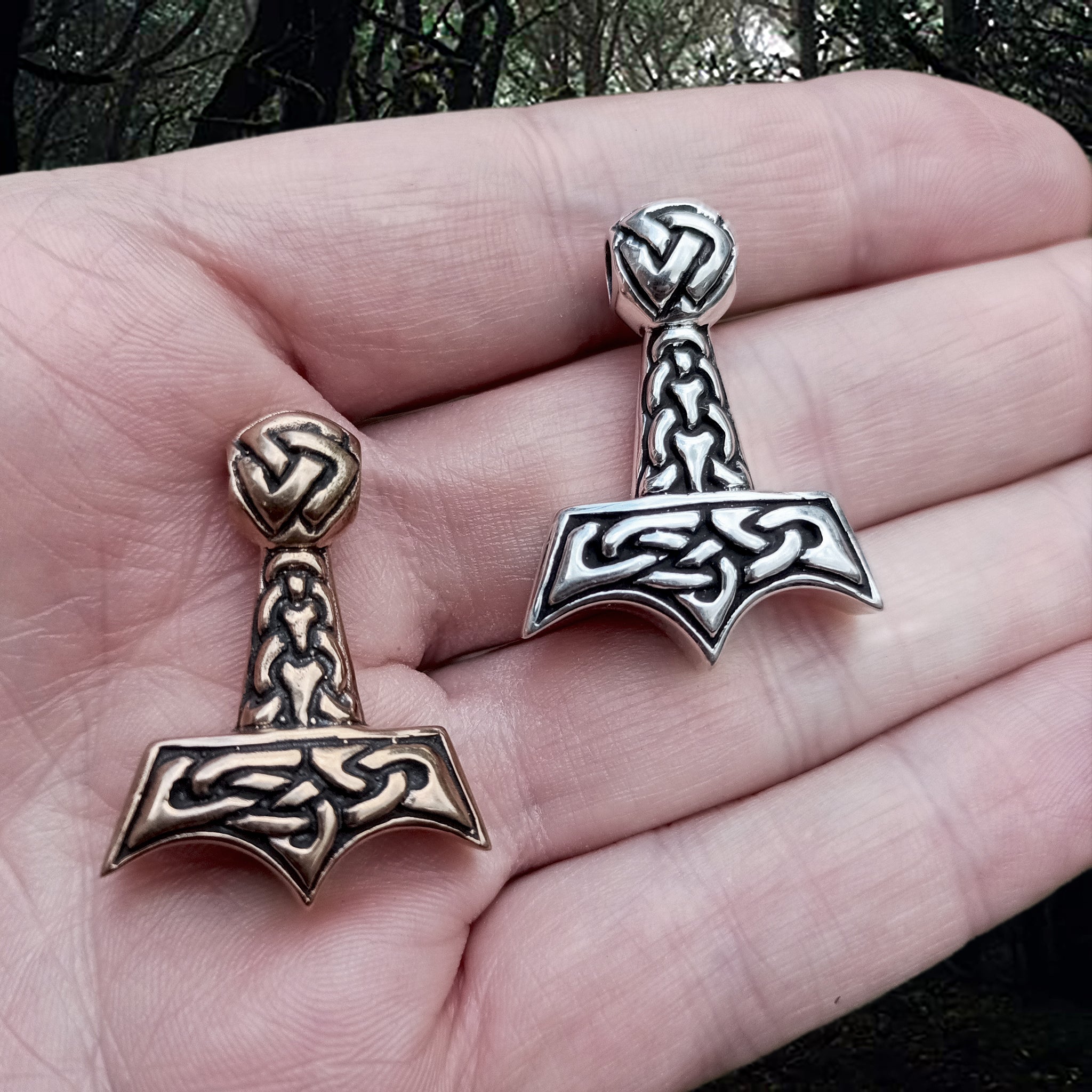 Knotwork Viking Thors Hammer Pendants in Bronze and Silver on Hand