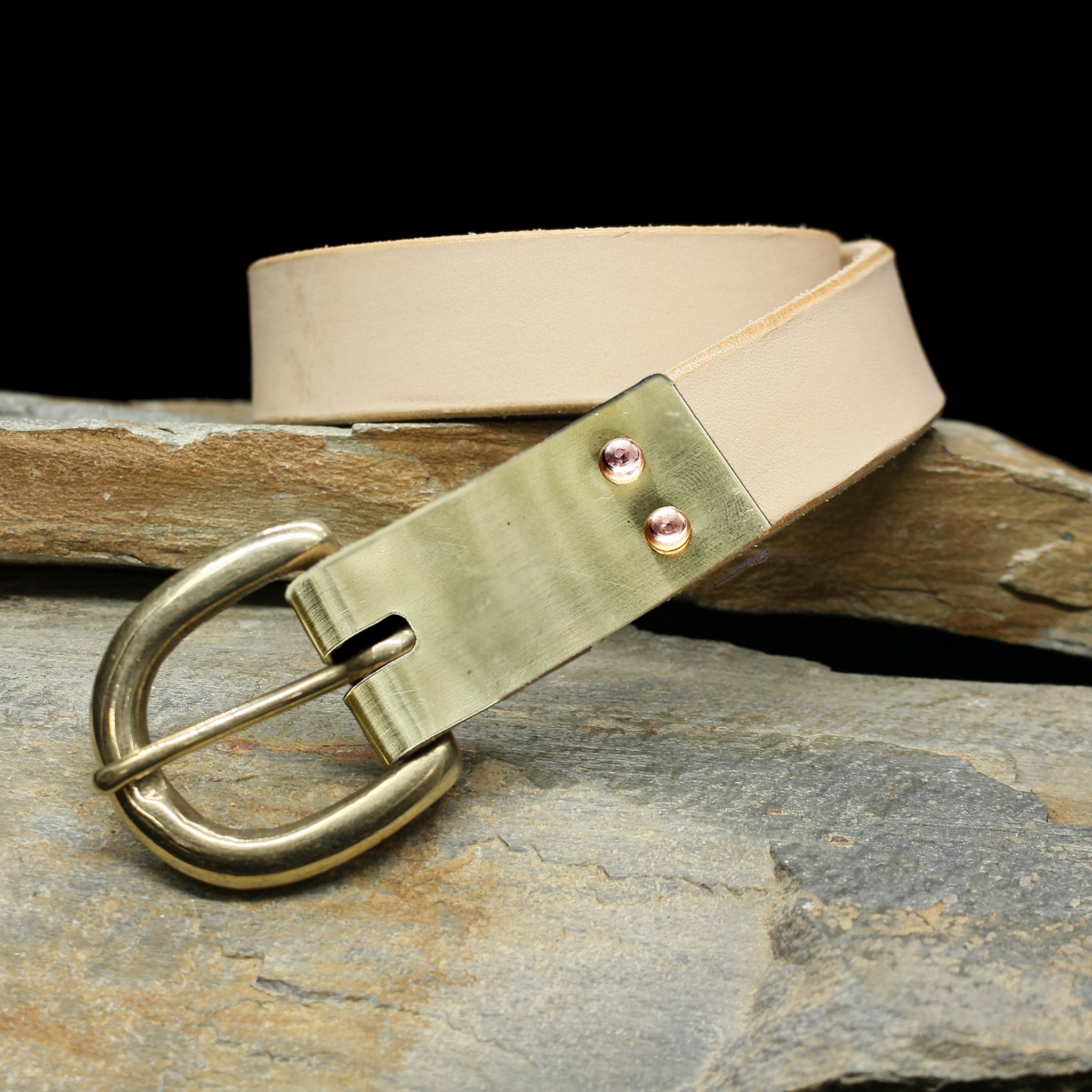 Natural Veg Tan 1 Inch (25mm) Wide Leather Viking Belt with Brass Buckle and Plain BRass Buckle Plate on Rock