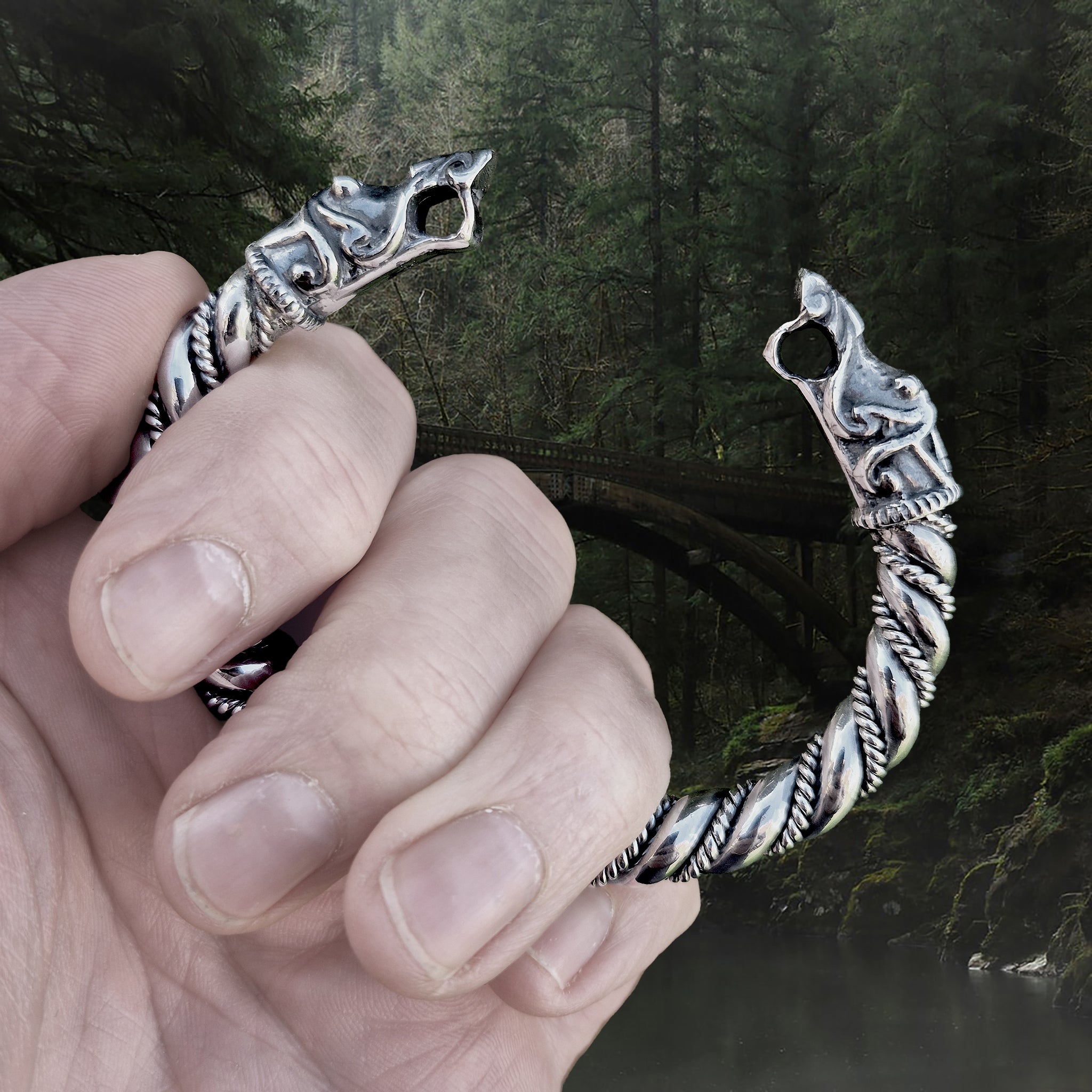 Thick Twisted Silver Arm Ring With Gotlandic Dragon Heads in Hand
