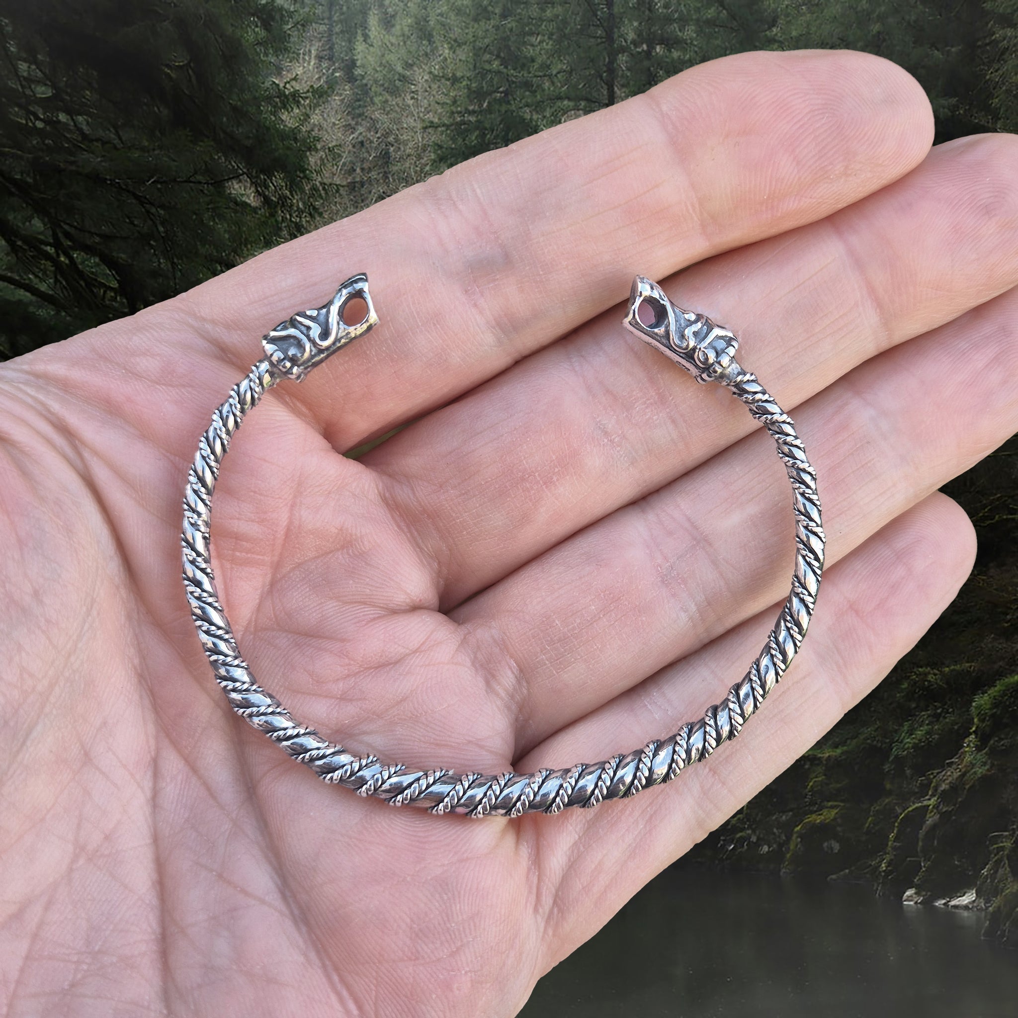 Slim Twisted Silver Viking Bracelet Replica With Gotlandic Dragon Heads on Hand