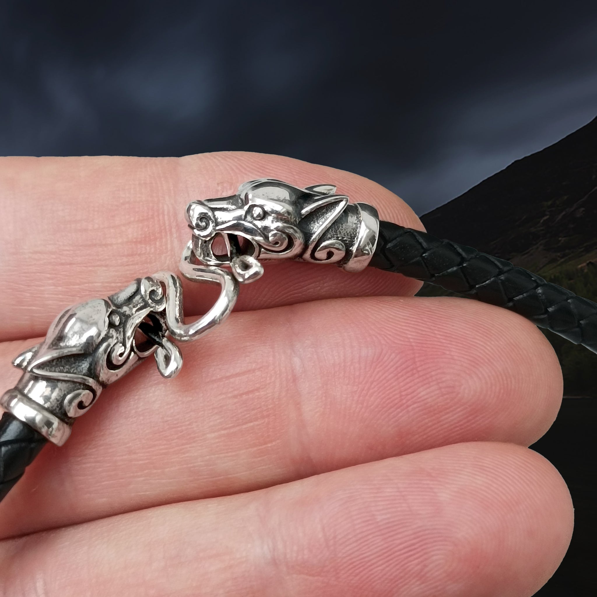 5mm Width Braided Leather Necklace with Silver Ferocious Wolf Heads on Hand - Close Up