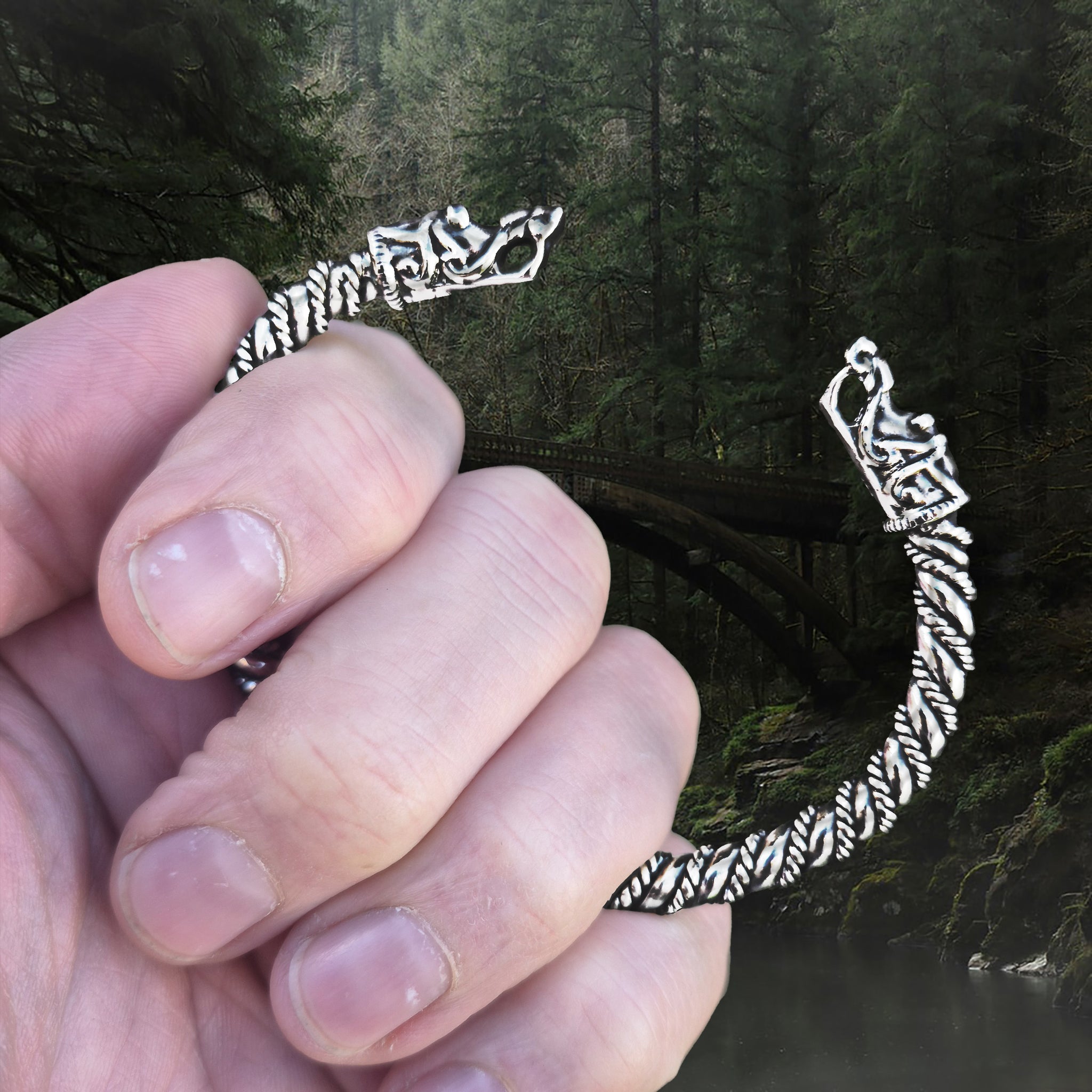 6mm Thick Twisted Silver Bracelet With Gotlandic Dragon Heads in Hand