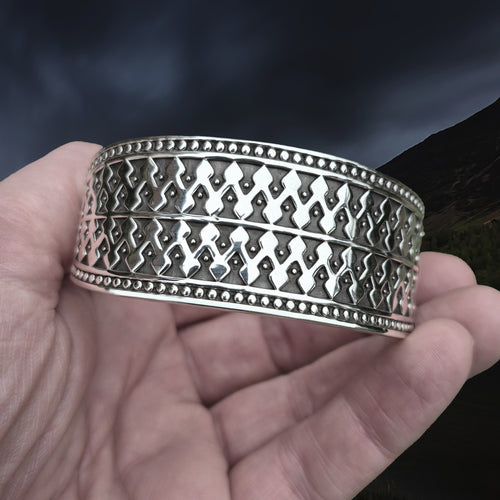 Silver Viking Bracelet / Arm Ring Replica From Anglesey with 1 Dot Design in Hand - Front View
