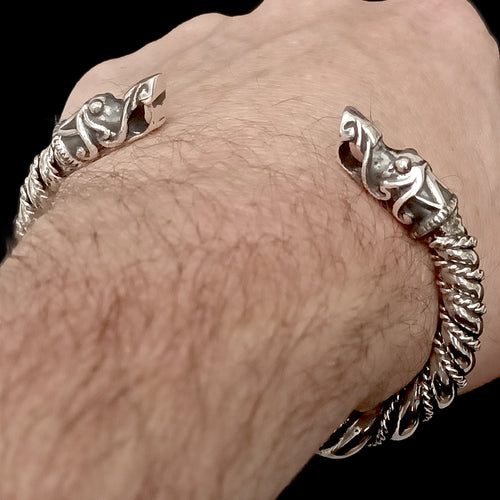 Thick Twisted Silver Arm Ring With Gotlandic Dragon Heads on Wrist